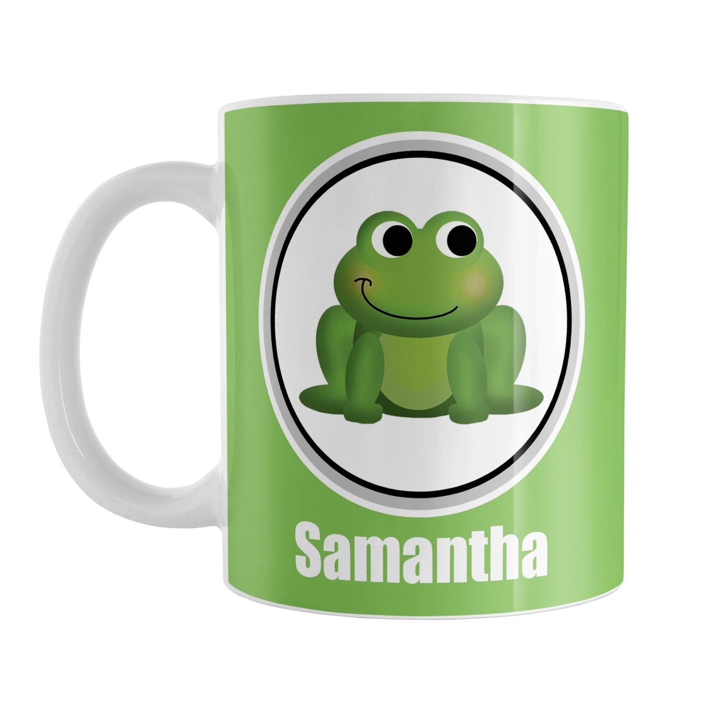 Personalized Adorable Green Frog Mug (11oz) at Amy's Coffee Mugs. A ceramic coffee mug designed with a cute and happy green frog in a white circle on both sides of the mug over a green background color that wraps around the mug up to the handle. Your name is custom-printed in white below the adorable frog.