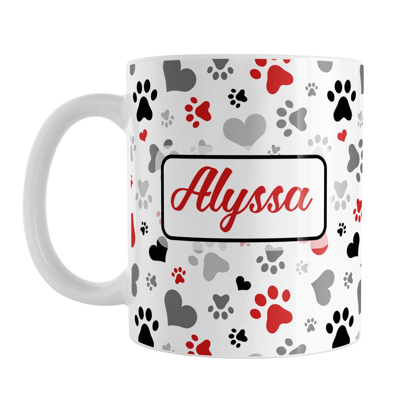 Personalized Black and Red Hearts and Paw Prints Mug (11oz) at Amy's Coffee Mugs. A ceramic coffee mug designed with a pattern of hearts and paw prints in red, black, and gray that wraps around the mug to the handle. Your name is custom printed in a red script font in a white rectangle on both sides of the mug over the paw prints pattern.