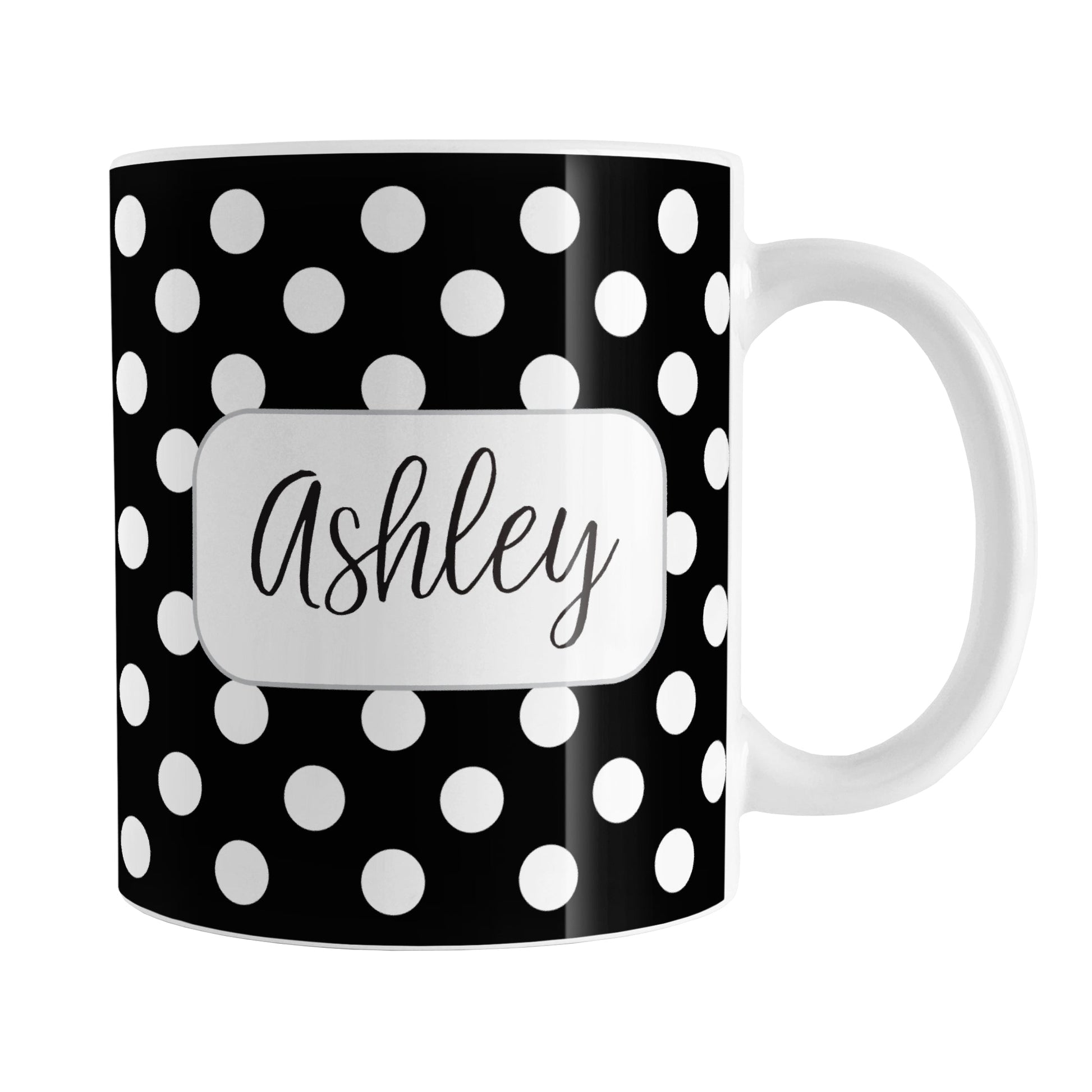 Personalized Black Polka Dot Mug (11oz) at Amy's Coffee Mugs. A ceramic coffee mug designed with a pattern of white polka dots over a black background color that wraps around the mug up to the handle. Your name is personalized in a cute black script font in a white frame design on both sides of the mug over the polka dot pattern.
