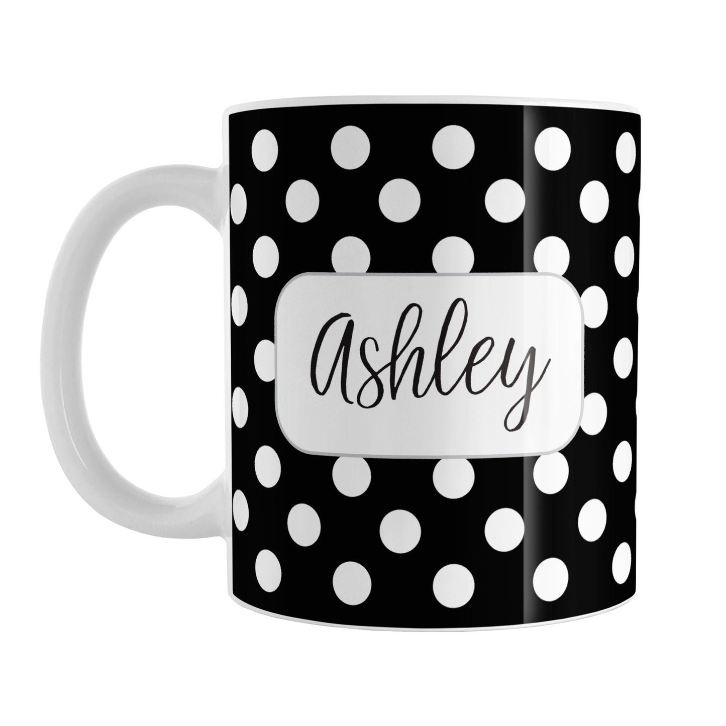 Personalized Black Polka Dot Mug (11oz) at Amy's Coffee Mugs. A ceramic coffee mug designed with a pattern of white polka dots over a black background color that wraps around the mug up to the handle. Your name is personalized in a cute black script font in a white frame design on both sides of the mug over the polka dot pattern.