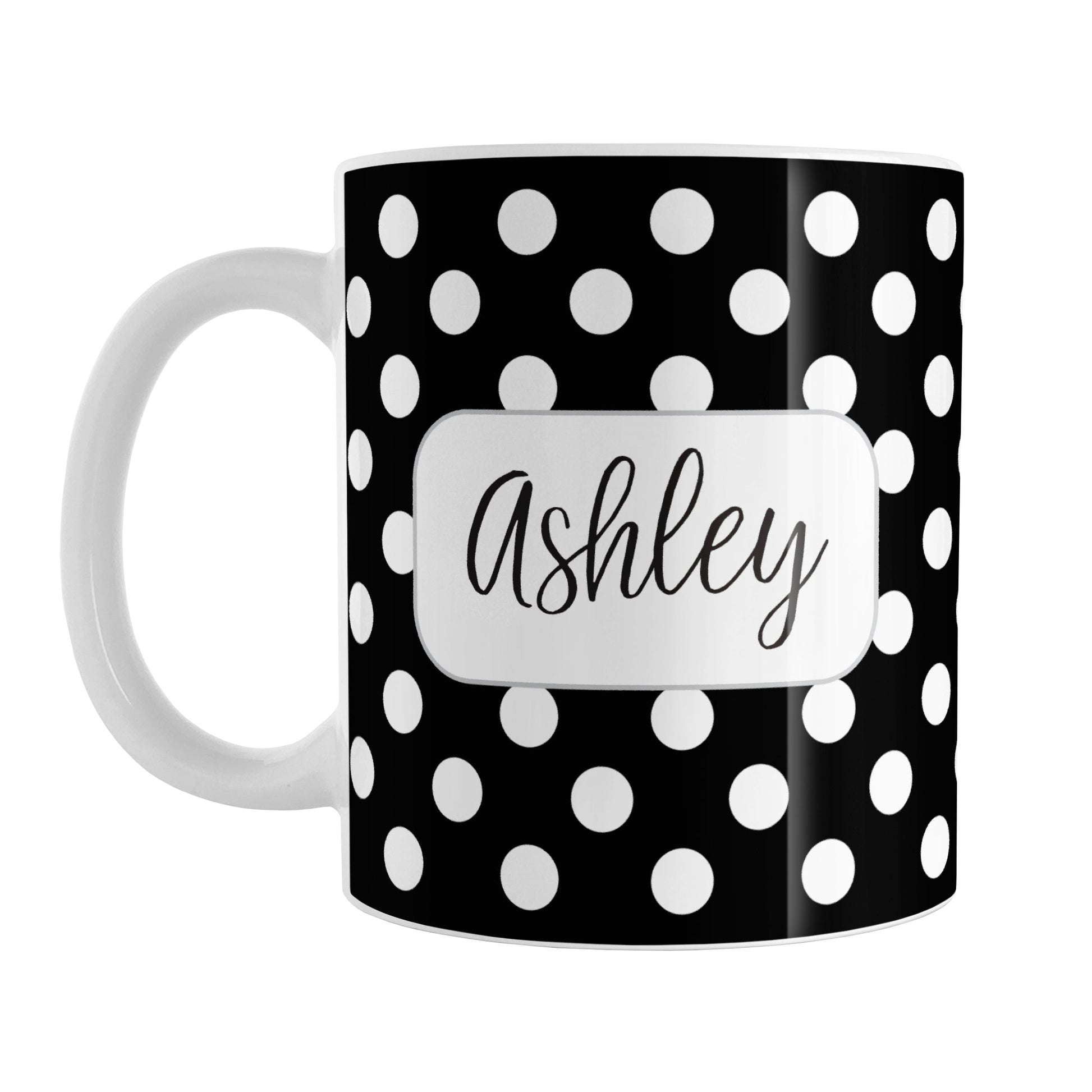 Personalized Black Polka Dot Mug (11oz) at Amy's Coffee Mugs. A ceramic coffee mug designed with a pattern of white polka dots over a black background color that wraps around the mug up to the handle. Your name is personalized in a cute black script font in a white frame design on both sides of the mug over the polka dot pattern.