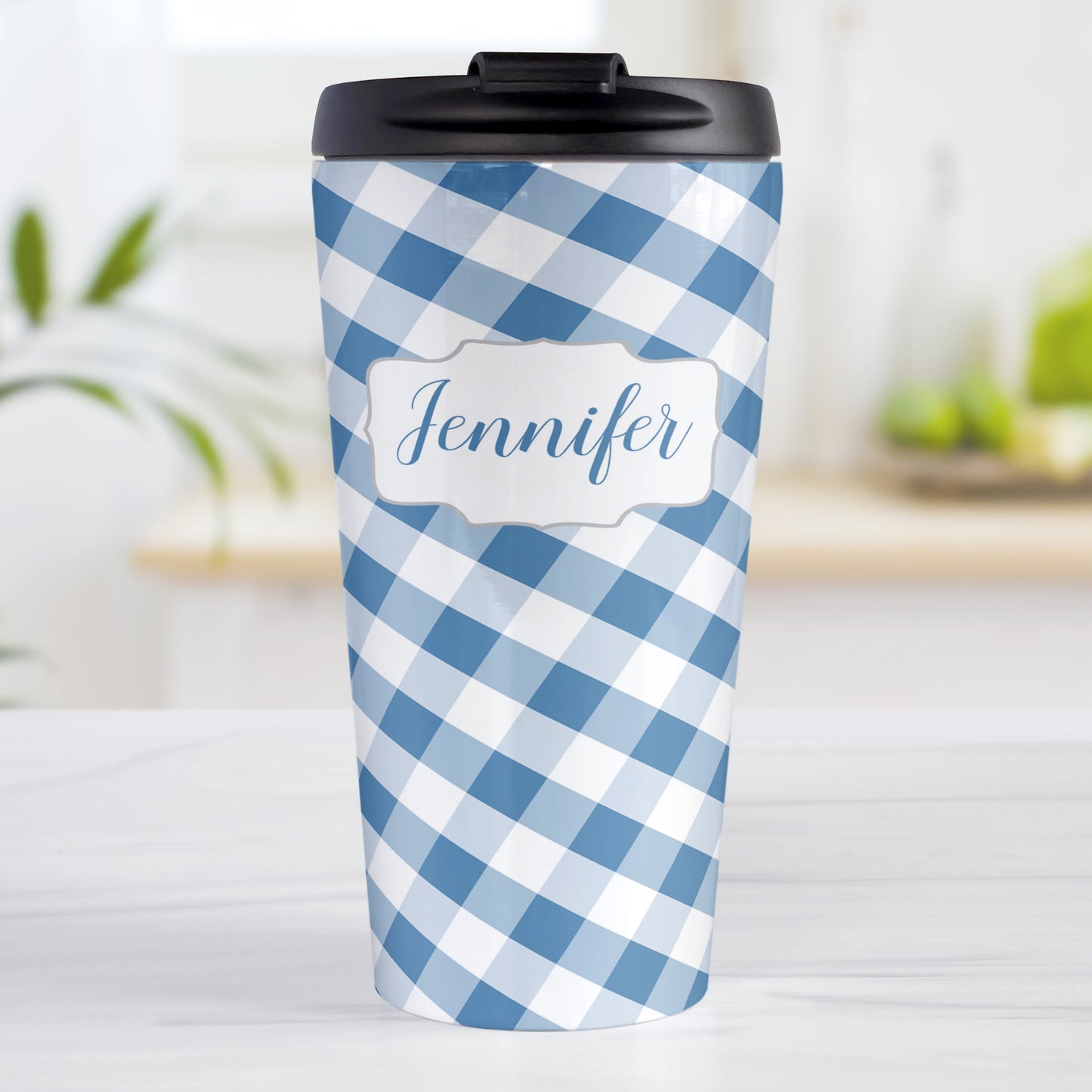 Personalized Blue Gingham Travel Mug (15oz, stainless steel insulated) at Amy's Coffee Mugs. A travel mug designed with a slanted blue and white gingham pattern that wraps around the travel mug. Your personalized name is custom-printed in a blue script font in a white frame design over the gingham pattern.