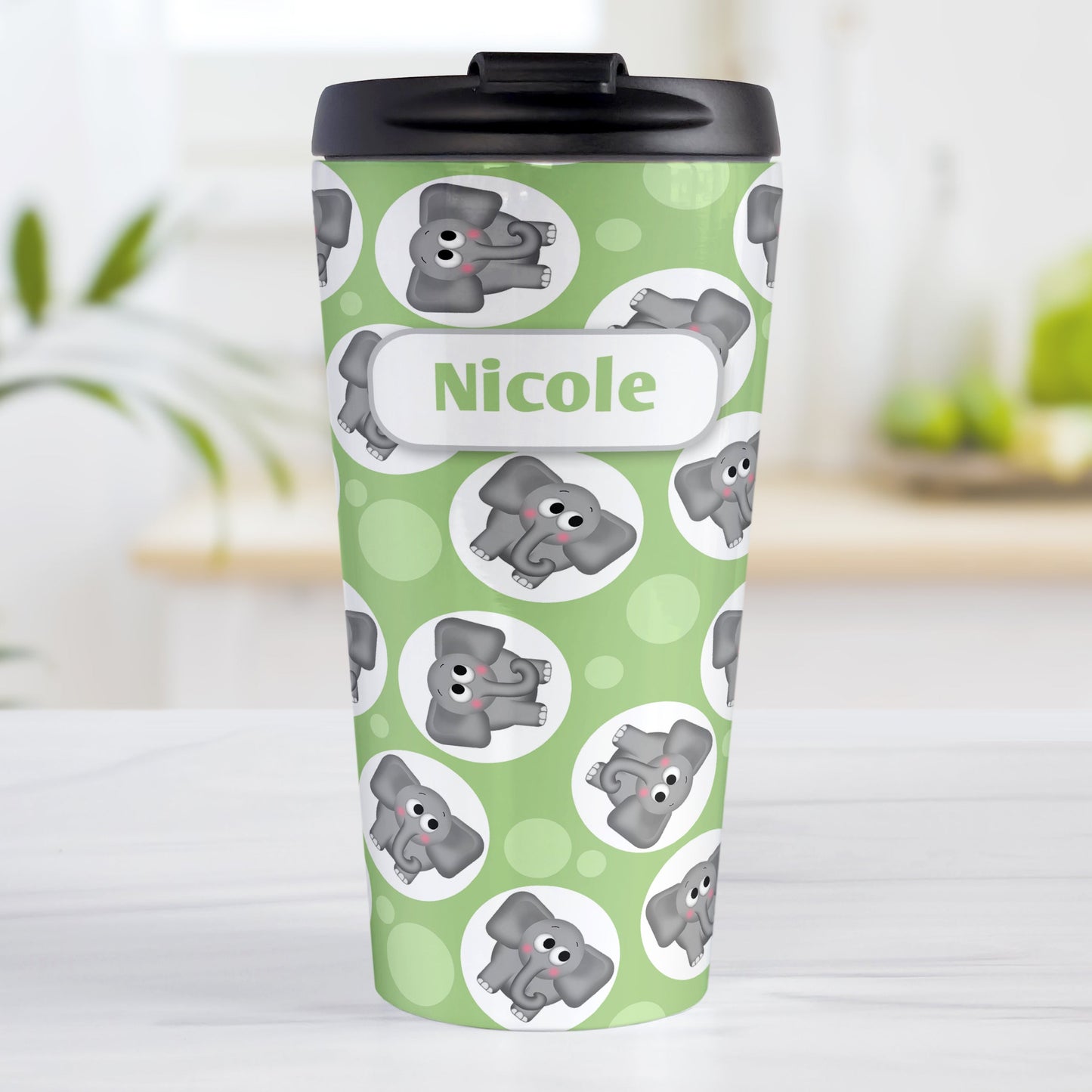 Personalized Cute Green Elephant Pattern Travel Mug (15oz, stainless steel insulated) at Amy's Coffee Mugs. A travel mug designed with cute and affectionate gray elephants in white circles scattered over a green background color in a pattern that wraps around the travel mug. Your name is custom printed in green on white positioned over the elephant pattern.