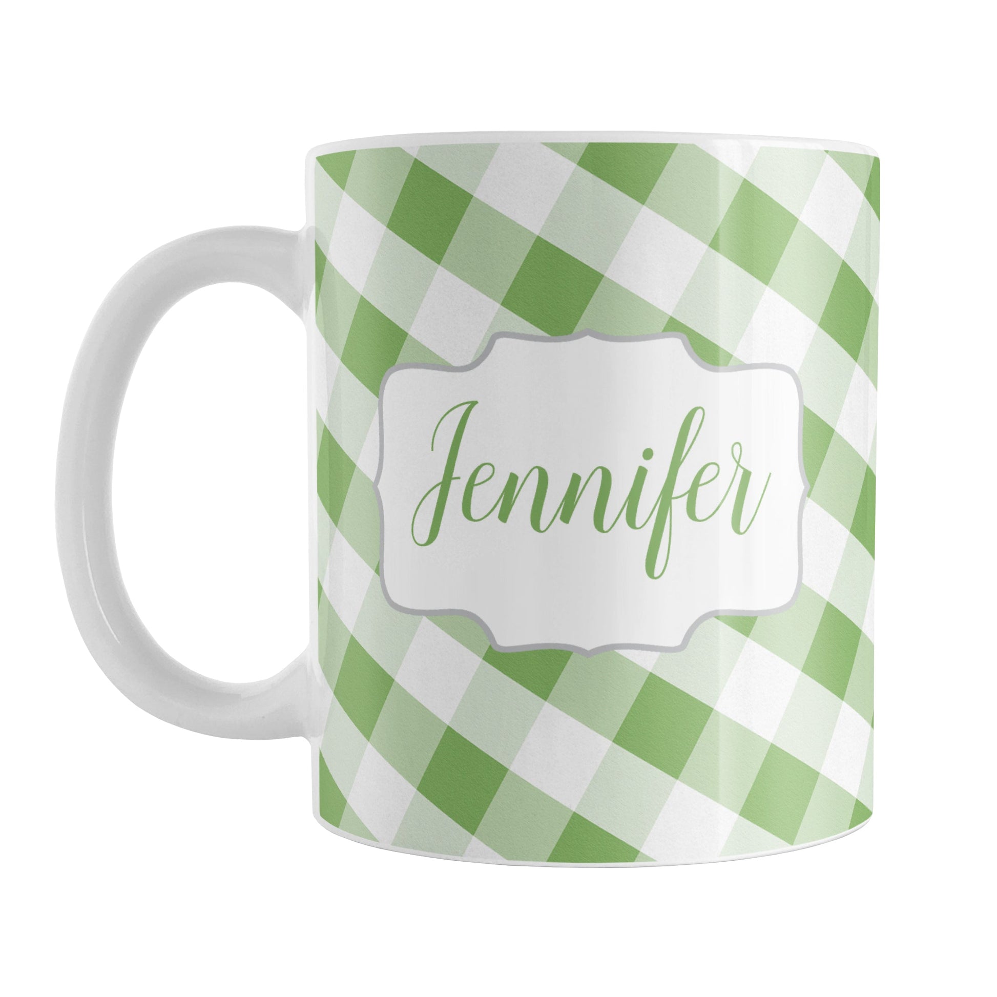 Personalized Green Gingham Mug (11oz) at Amy's Coffee Mugs. A ceramic coffee mug designed with a slanted green and white gingham pattern that wraps around the mug up to the handle. Your personalized name is custom-printed in a green script font on both sides of the mug over the gingham pattern.