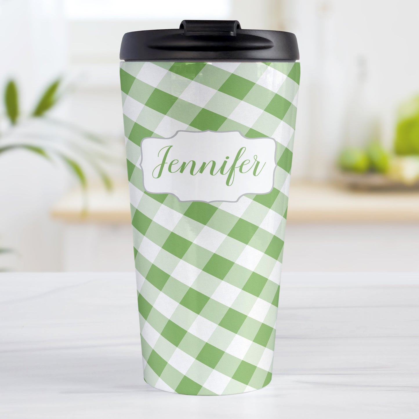 Personalized Green Gingham Travel Mug (15oz, stainless steel insulated) at Amy's Coffee Mugs. A travel mug designed with a slanted green and white gingham pattern that wraps around the travel mug. Your personalized name is custom-printed in a green script font in a white frame design over the gingham pattern.