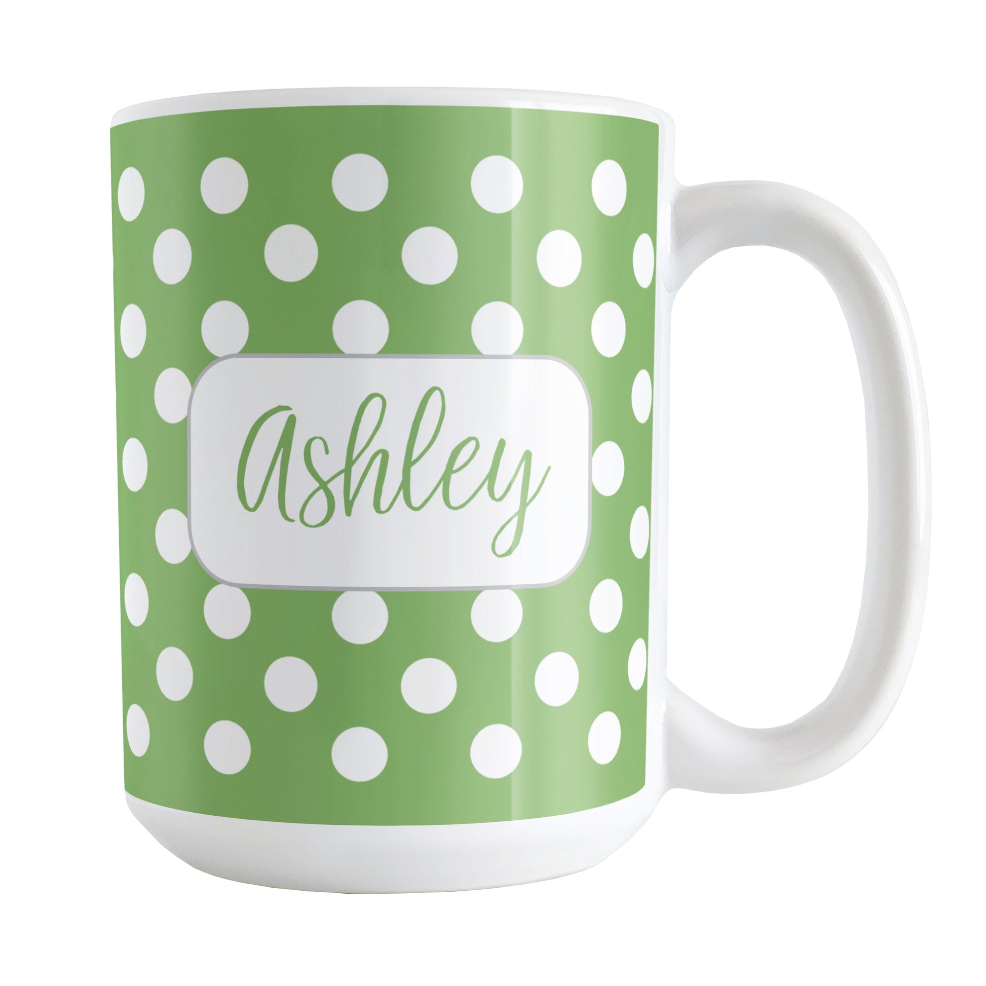 Personalized Green Polka Dot Mug (15oz) at Amy's Coffee Mugs. A ceramic coffee mug designed with a pattern of white polka dots over a green background color that wraps around the mug up to the handle. Your name is personalized in a cute green script font in a white frame design on both sides of the mug over the polka dot pattern.
