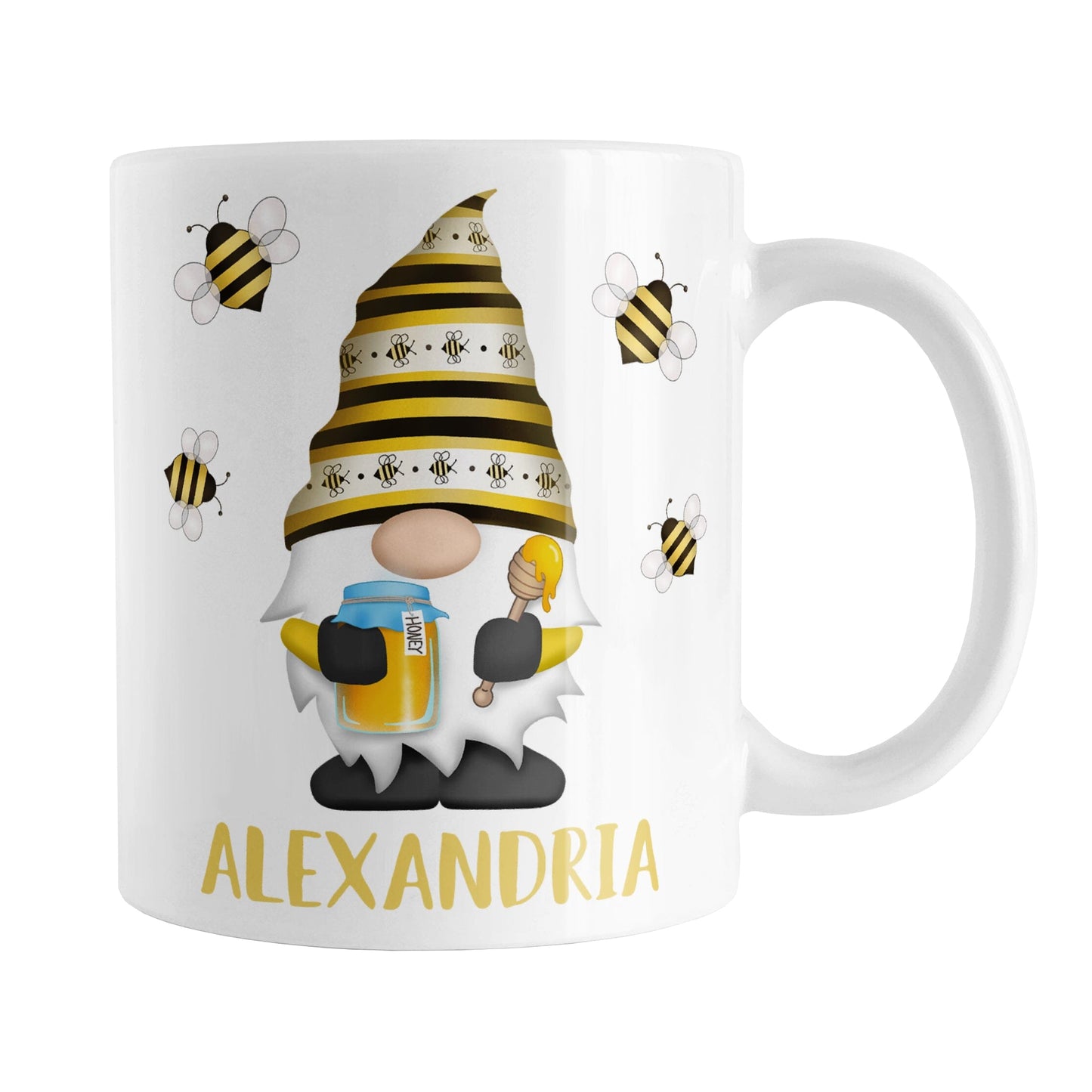 Personalized Honey Bee Gnome Mug (11oz) at Amy's Coffee Mugs. A ceramic coffee mug designed with a gnome wearing an adorable hat with black and yellow stripes and bees, holding a jar of honey and a honey dipper, with bees flying around the gnome. Your name is personalized in a fun yellow font below the gnome, making this a great gift. This cute honey bee gnome illustration and name are on both sides of the mug.