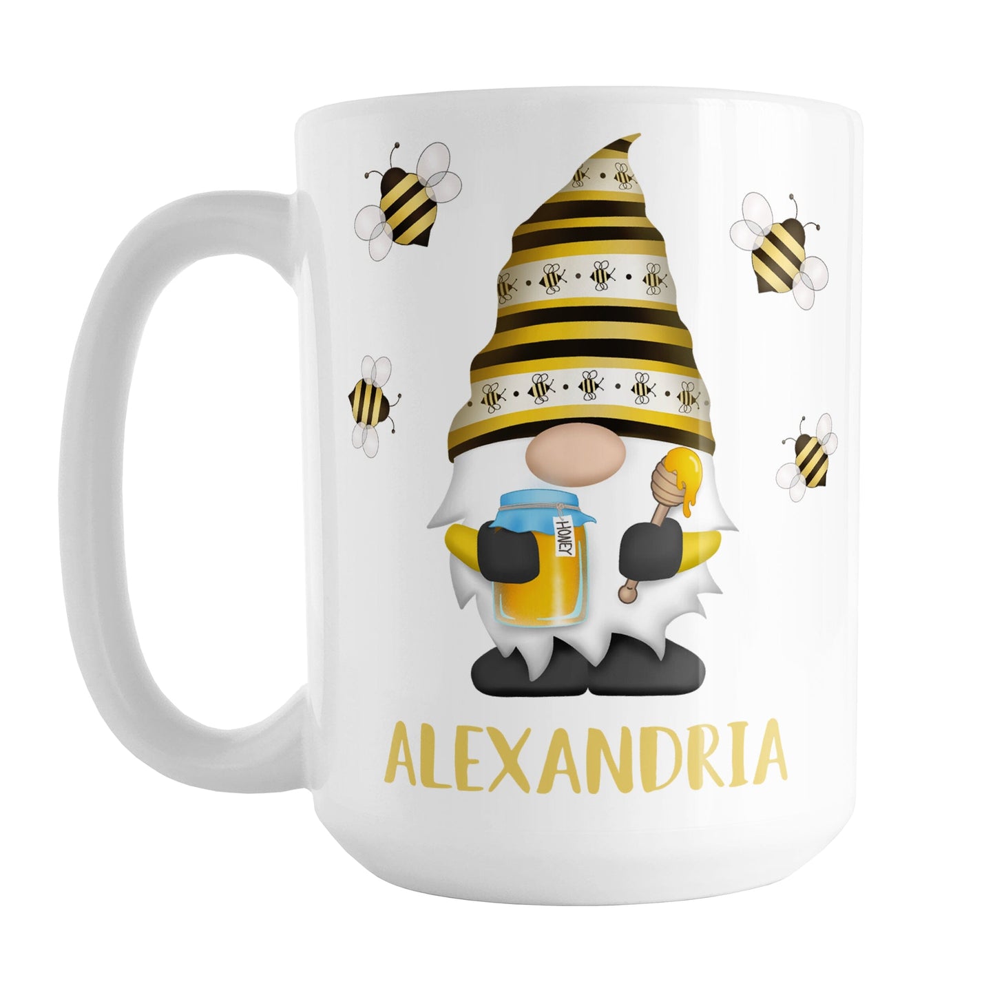 Personalized Honey Bee Gnome Mug (15oz) at Amy's Coffee Mugs. A ceramic coffee mug designed with a gnome wearing an adorable hat with black and yellow stripes and bees, holding a jar of honey and a honey dipper, with bees flying around the gnome. Your name is personalized in a fun yellow font below the gnome, making this a great gift. This cute honey bee gnome illustration and name are on both sides of the mug.