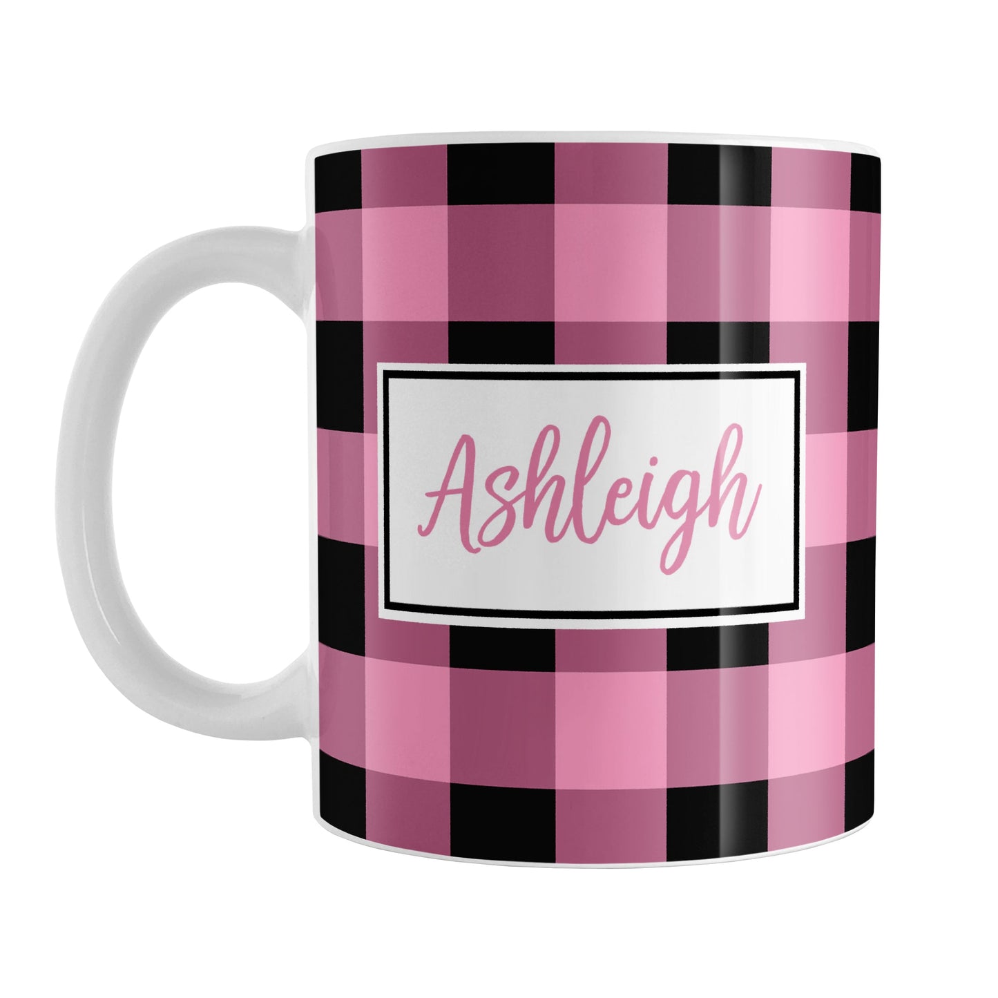 Personalized Name Light Pink and Black Buffalo Plaid Mug (11oz) at Amy's Coffee Mugs. A ceramic coffee mug designed with a black and light pink buffalo plaid (buffalo check) pattern that wraps around the mug up to the handle. Your name is custom printed in pink inside a white frame design on both sides of the mug over the buffalo plaid pattern.
