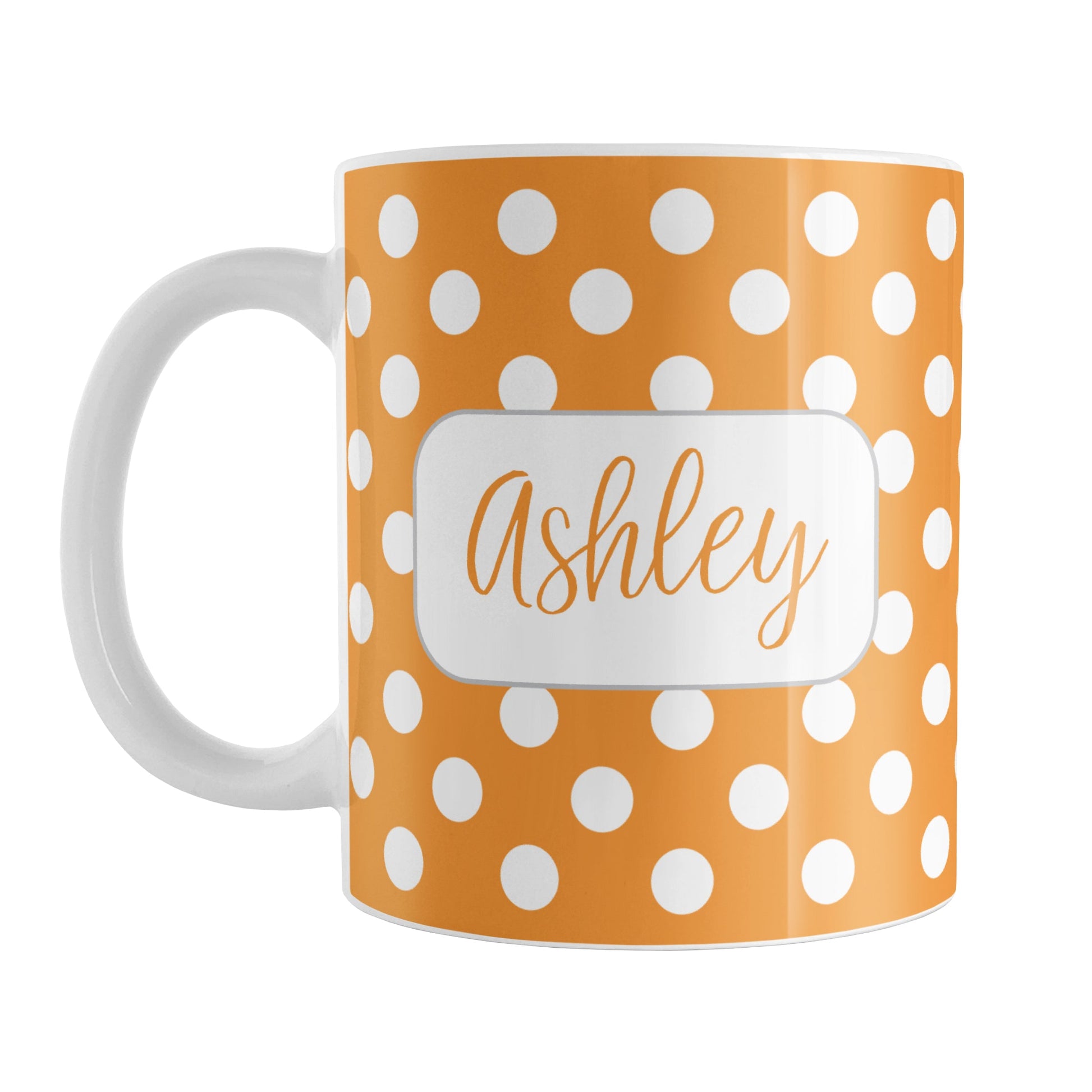 Personalized Orange Polka Dot Mug (11oz) at Amy's Coffee Mugs. A ceramic coffee mug designed with a pattern of white polka dots over an orange background color that wraps around the mug up to the handle. Your name is personalized in a cute orange script font in a white frame design on both sides of the mug over the polka dot pattern.