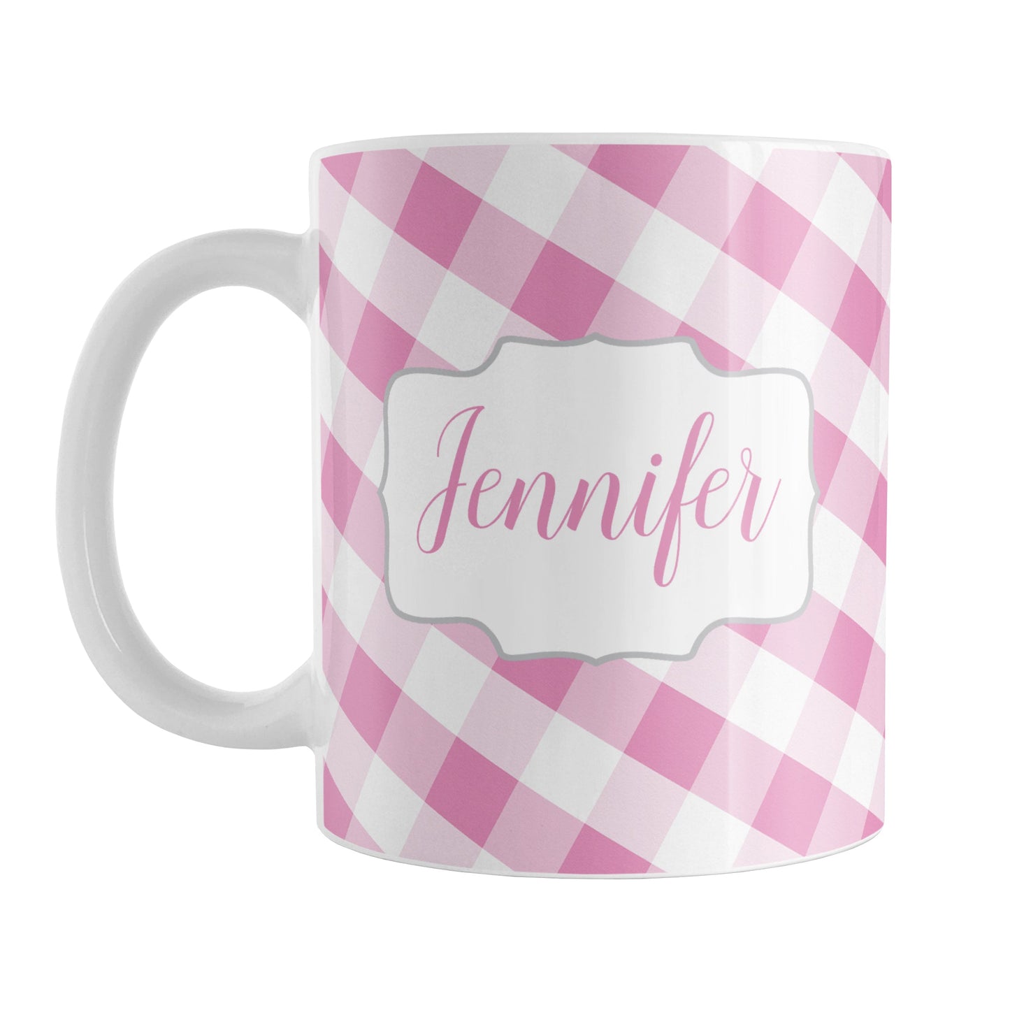 Personalized Pink Gingham Mug (11oz) at Amy's Coffee Mugs. A ceramic coffee mug designed with a slanted pink and white gingham pattern that wraps around the mug up to the handle. Your personalized name is custom-printed in a pink script font on both sides of the mug over the gingham pattern.
