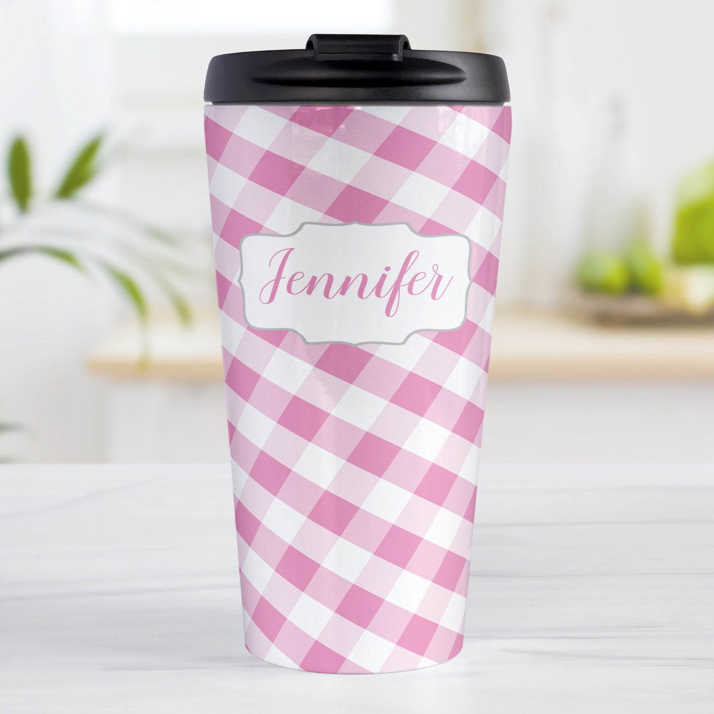Personalized Pink Gingham Travel Mug (15oz, stainless steel insulated) at Amy's Coffee Mugs. A travel mug designed with a slanted pink and white gingham pattern that wraps around the travel mug. Your personalized name is custom-printed in a pink script font in a white frame design over the gingham pattern.