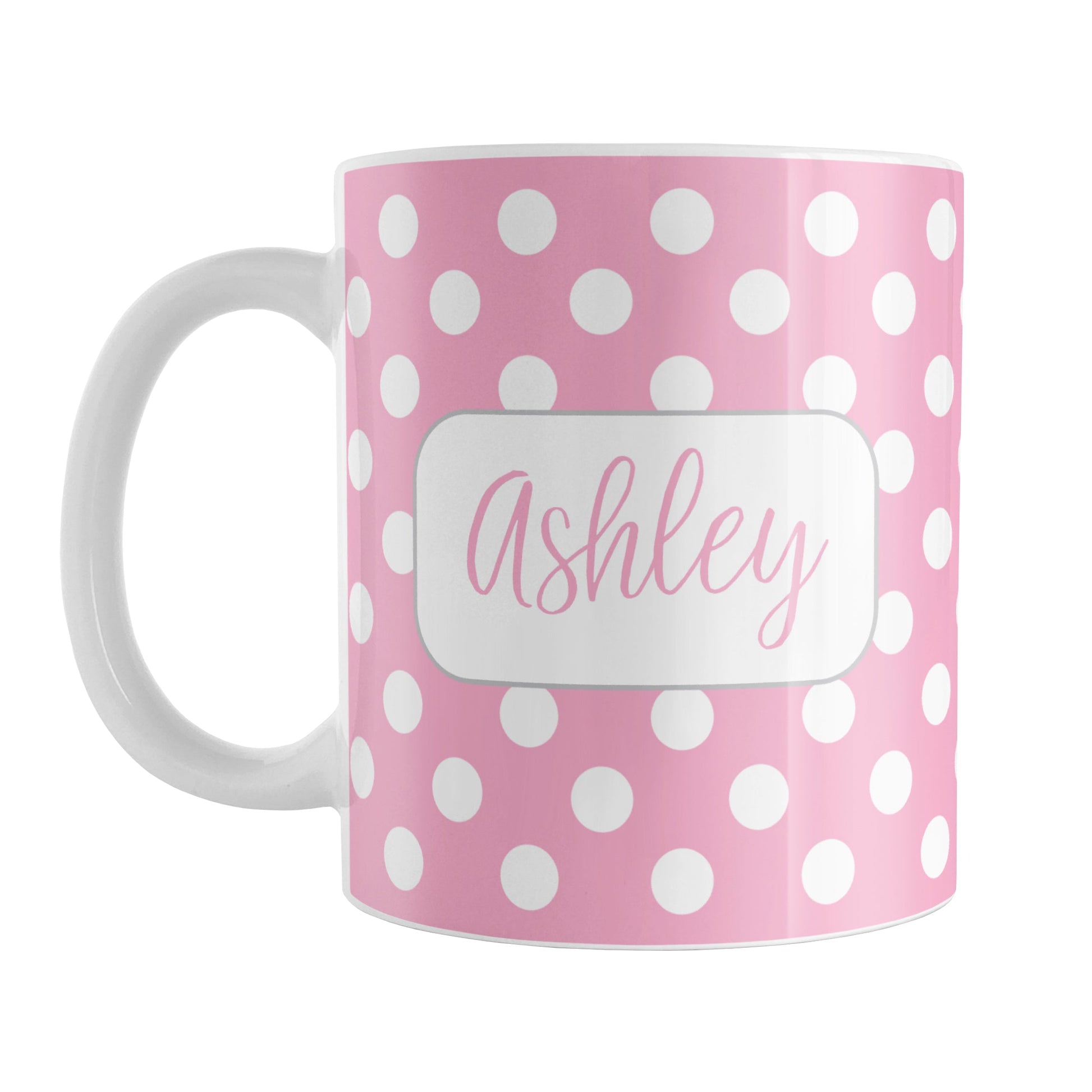 Personalized Pink Polka Dot Mug (11oz) at Amy's Coffee Mugs. A ceramic coffee mug designed with a pattern of white polka dots over a pink background color that wraps around the mug up to the handle. Your name is personalized in a cute pink script font in a white frame design on both sides of the mug over the polka dot pattern.