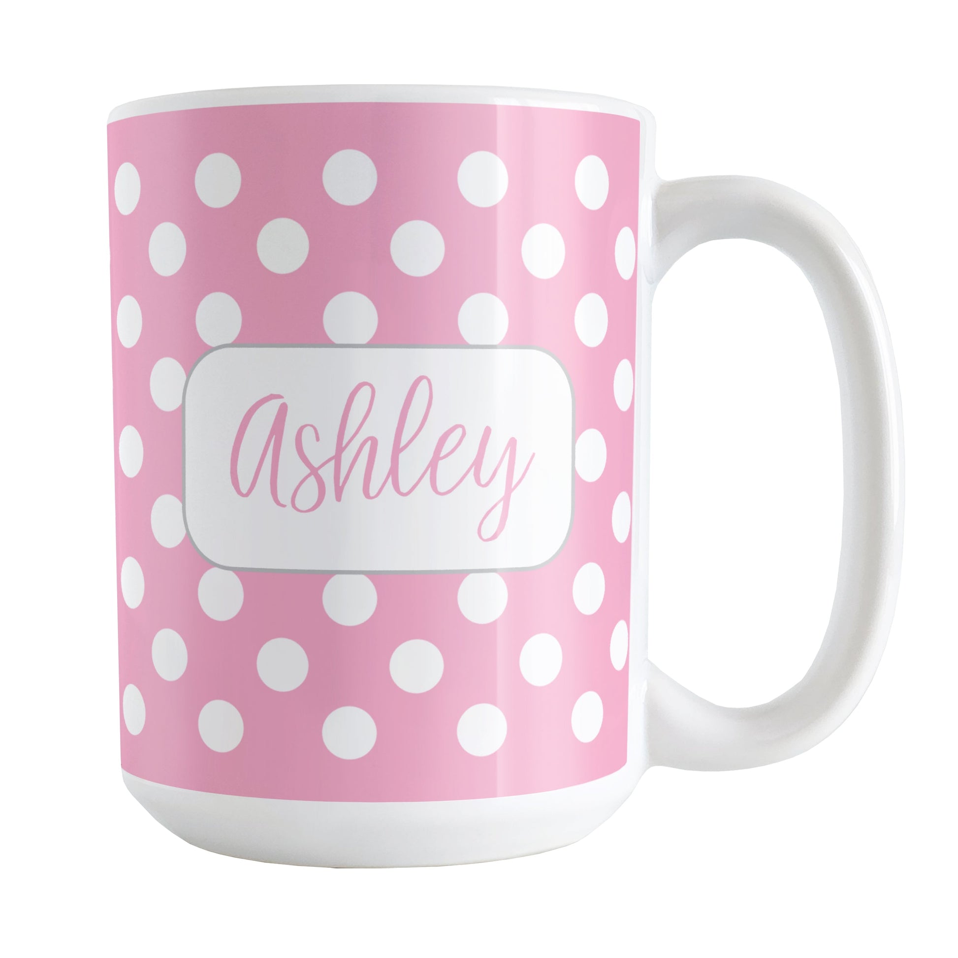Personalized Pink Polka Dot Mug (15oz) at Amy's Coffee Mugs. A ceramic coffee mug designed with a pattern of white polka dots over a pink background color that wraps around the mug up to the handle. Your name is personalized in a cute pink script font in a white frame design on both sides of the mug over the polka dot pattern.