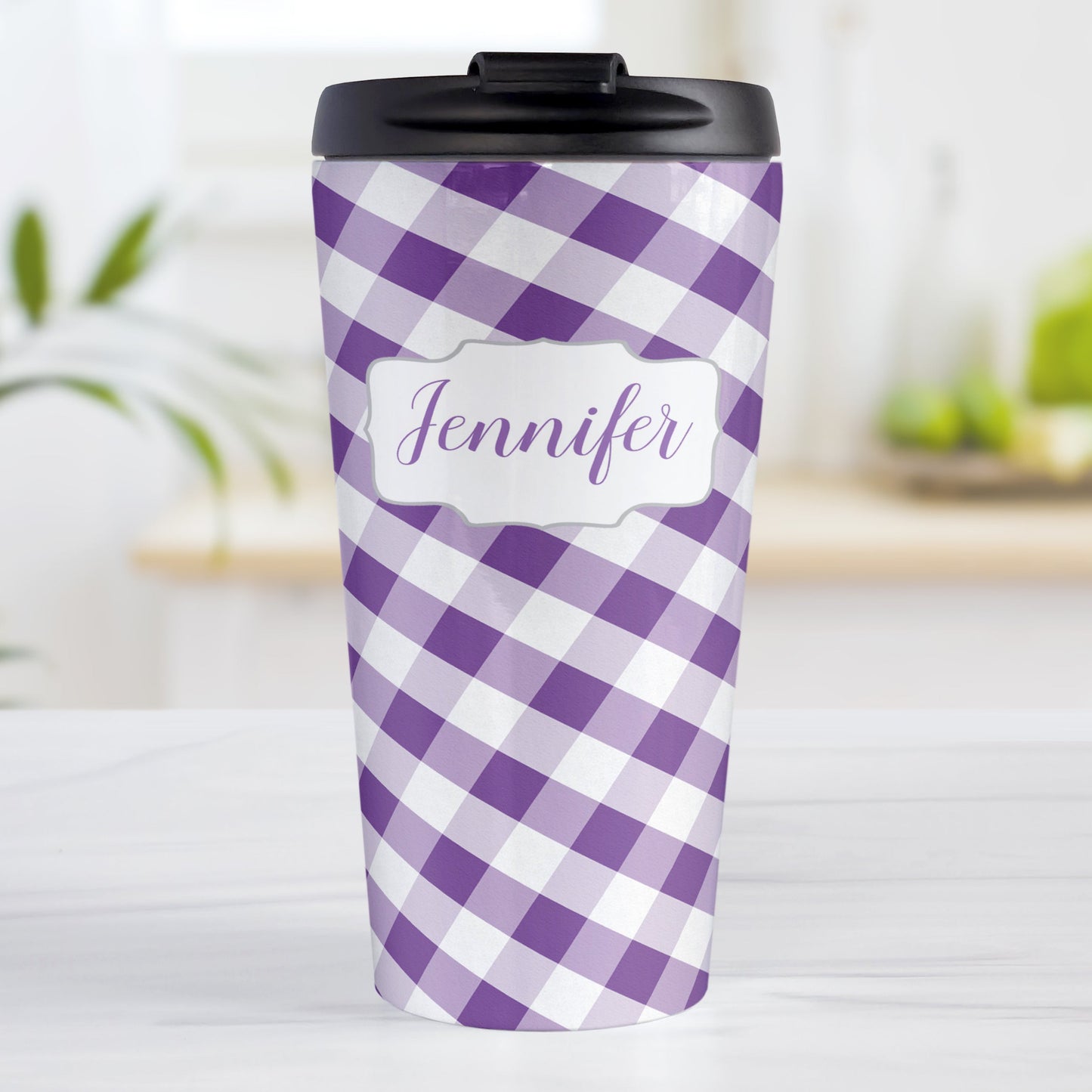 Personalized Purple Gingham Travel Mug (15oz, stainless steel insulated) at Amy's Coffee Mugs. A travel mug designed with a slanted purple and white gingham pattern that wraps around the travel mug. Your personalized name is custom-printed in a purple script font in a white frame design over the gingham pattern.