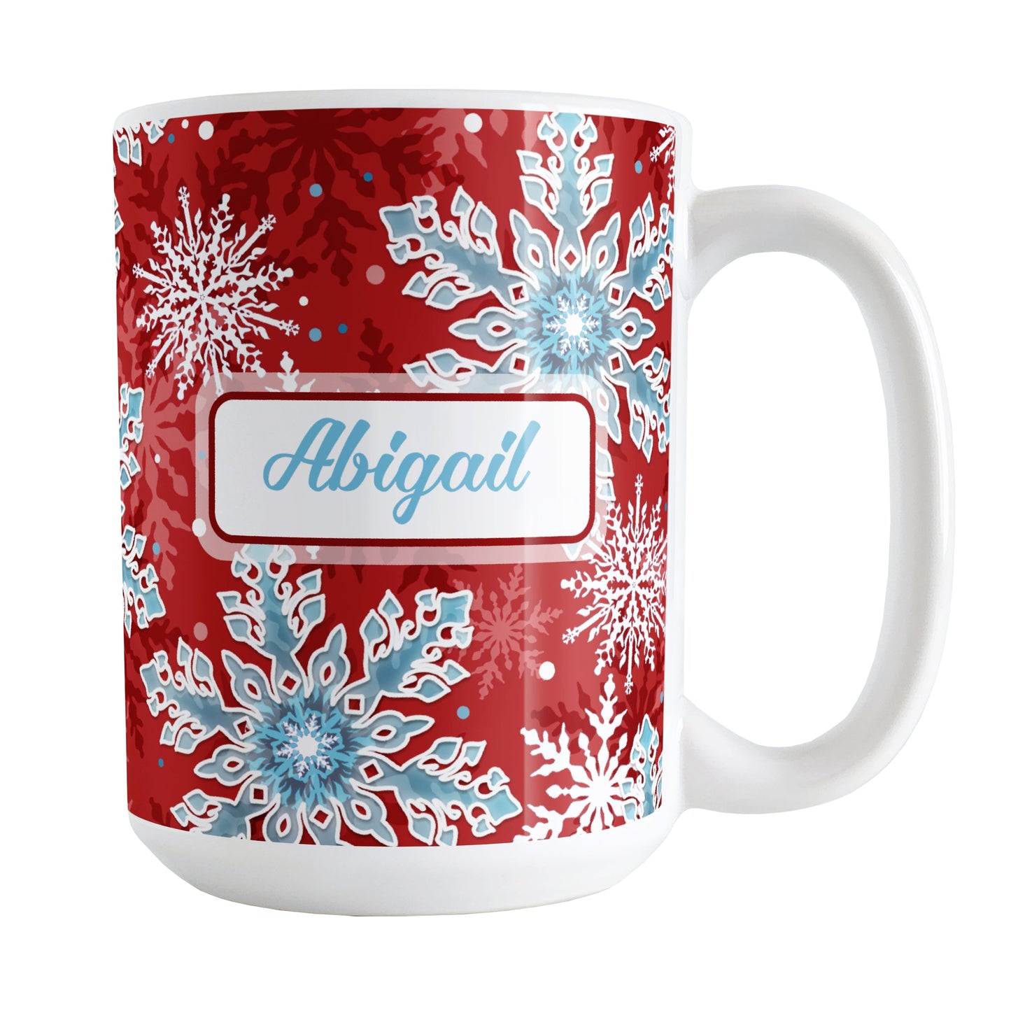 Personalized Red Blue Snowflake Winter Mug (15oz) at Amy's Coffee Mugs. A ceramic coffee mug designed with a pattern of aqua blue and white snowflakes over a red background color that wraps around the mug to the handle. Your name is custom printed in an aqua blue script font on both sides of the mug.