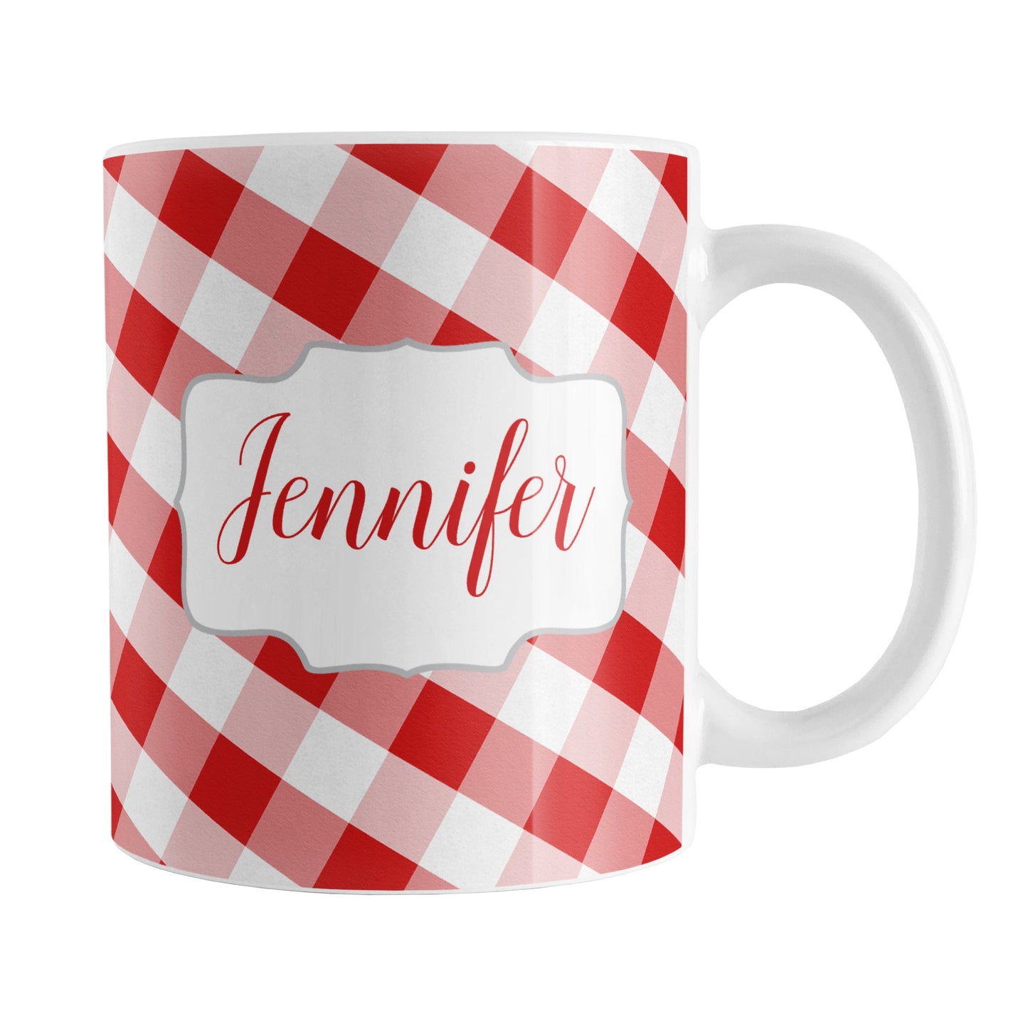 Personalized Red Gingham Mug (11oz) at Amy's Coffee Mugs. A ceramic coffee mug designed with a slanted red and white gingham pattern that wraps around the mug up to the handle. Your personalized name is custom-printed in a red script font on both sides of the mug over the gingham pattern.
