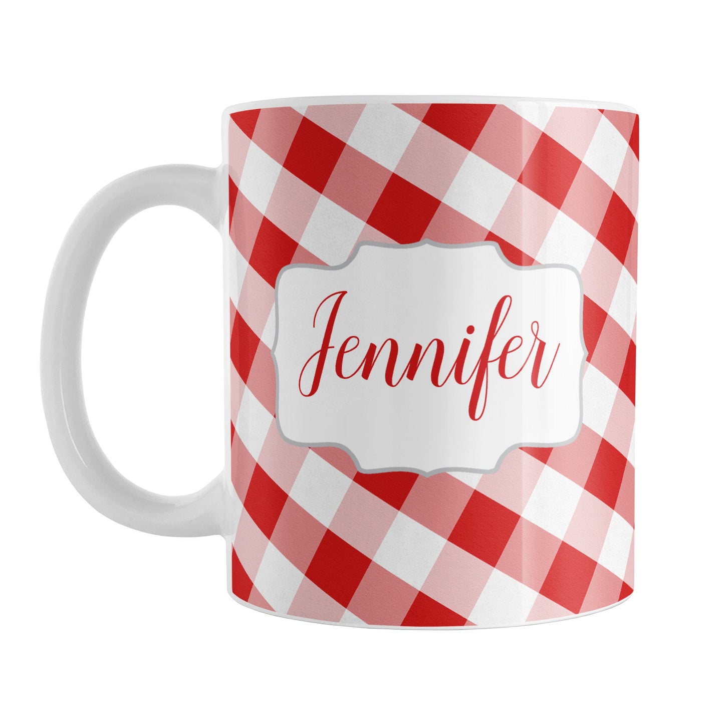 Personalized Red Gingham Mug (11oz) at Amy's Coffee Mugs. A ceramic coffee mug designed with a slanted red and white gingham pattern that wraps around the mug up to the handle. Your personalized name is custom-printed in a red script font on both sides of the mug over the gingham pattern.