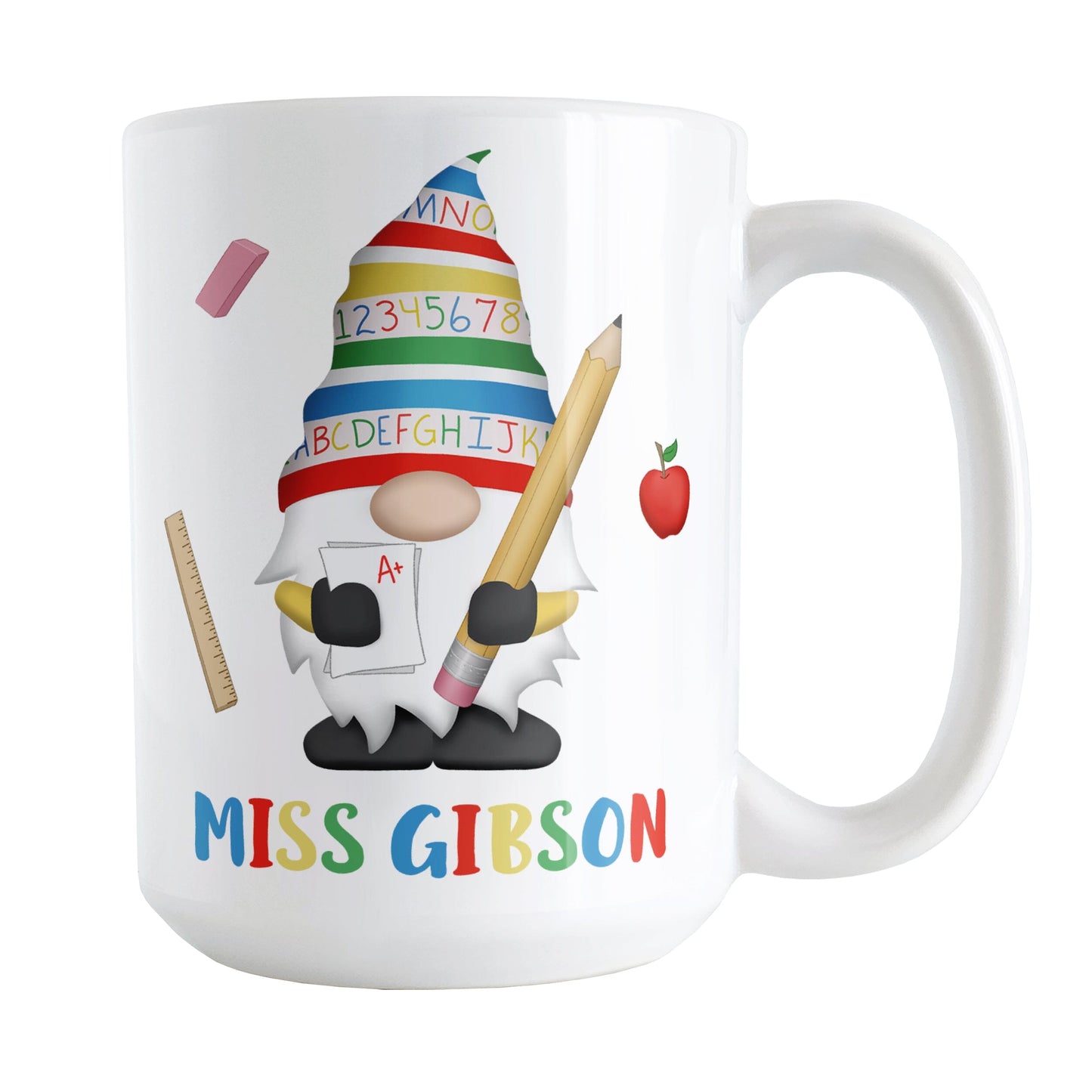Personalized School Teacher Gnome Mug (15oz) at Amy's Coffee Mugs. A ceramic coffee mug designed with an illustration of an adorable gnome wearing a festive hat with numbers and letters in primary colors and holding a large oversized pencil and graded A+ paper. Around the gnome are an eraser, a ruler, and a red apple. Your personalized name or your teacher's name is custom printed below the gnome in blue, red, yellow, and green alternating colored letters.