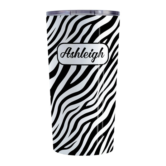 Personalized Zebra Print Pattern Tumbler Cup (20oz, stainless steel insulated) at Amy's Coffee Mugs. A tumbler cup designed with an animal print pattern of black and white zebra stripes that wraps around the cup. Your name is custom-printed in a stylish black script font in a white rectangular design over the zebra print pattern.
