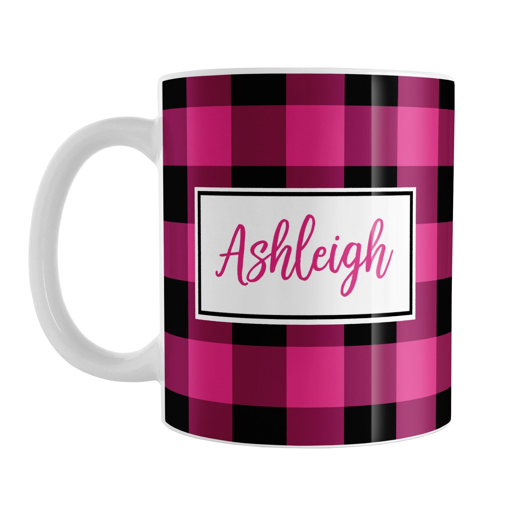 Pink and Black Personalized Name Buffalo Plaid Mug (11oz) at Amy's Coffee Mugs. A ceramic coffee mug designed with a raspberry pink and black buffalo plaid (buffalo check) pattern that wraps around the mug up to the handle. Your name is printed in a raspberry pink script font in a white frame design on both sides of the mug over the buffalo plaid background.