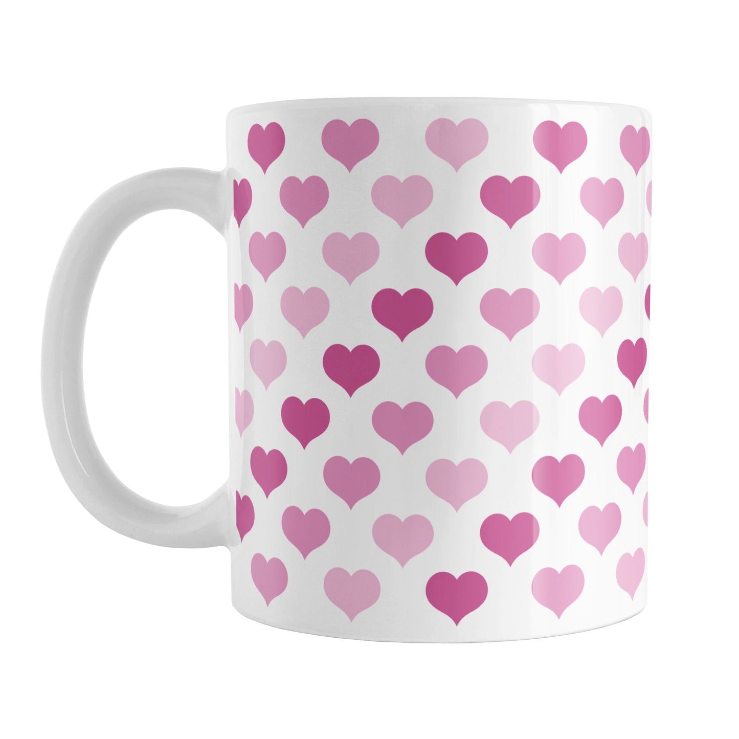 Pink Hearts Pattern Mug (11oz) at Amy's Coffee Mugs. A ceramic coffee mug designed with a pattern of hearts in three different shades of pink that wraps around the mug up to the handle.