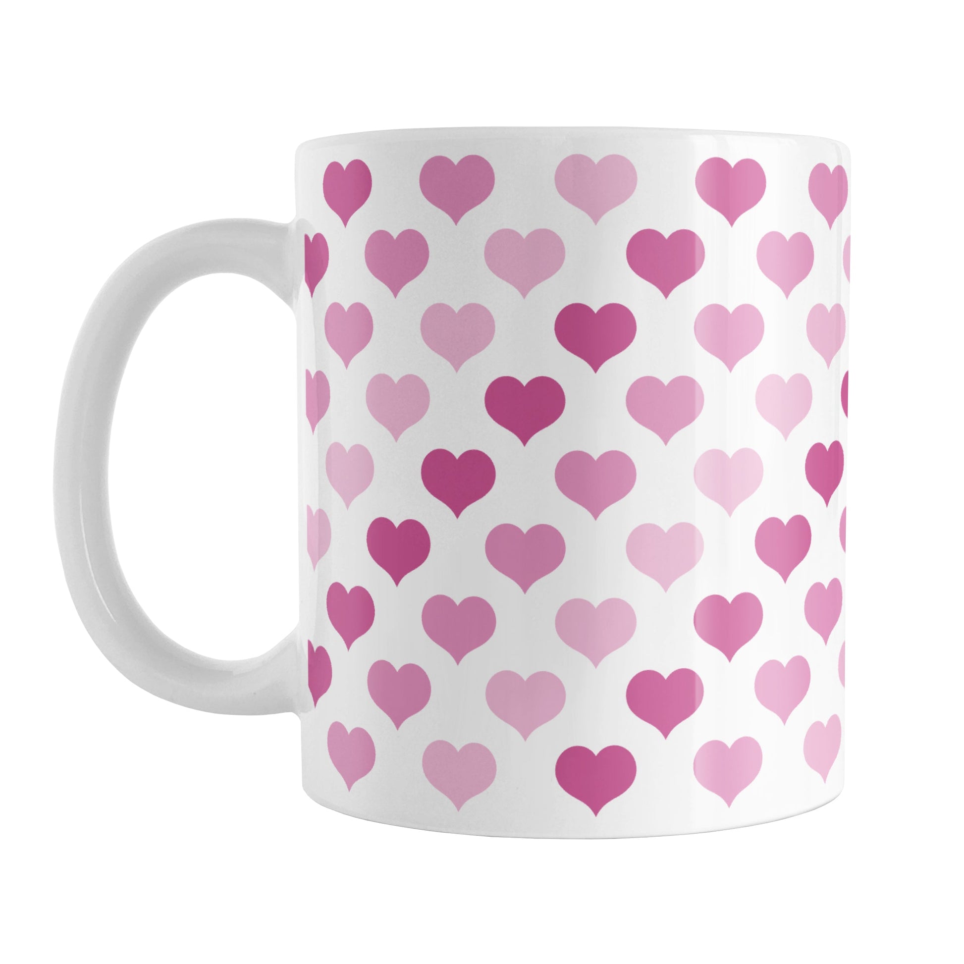Pink Hearts Pattern Mug (11oz) at Amy's Coffee Mugs. A ceramic coffee mug designed with a pattern of hearts in three different shades of pink that wraps around the mug up to the handle.