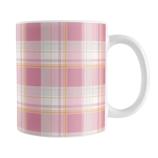 Pink Orange Plaid Mug (11oz) at Amy's Coffee Mugs. A ceramic coffee mug designed with a fashionable plaid pattern with varying shades of pink with orange accents that wraps around the mug up to the handle.