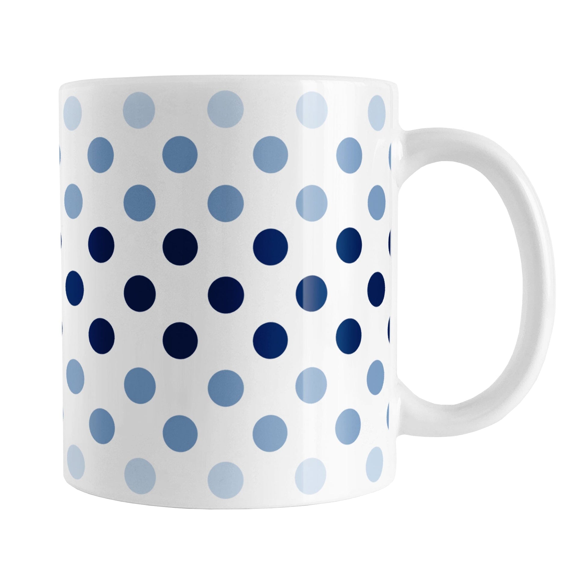 Polka Dots in Blue Mug (11oz) at Amy's Coffee Mugs. A ceramic coffee mug designed with polka dots in different shades of blue, with the darker blue color across the middle and the lighter blue along the top and bottom, in a pattern that wraps around the mug to the handle.