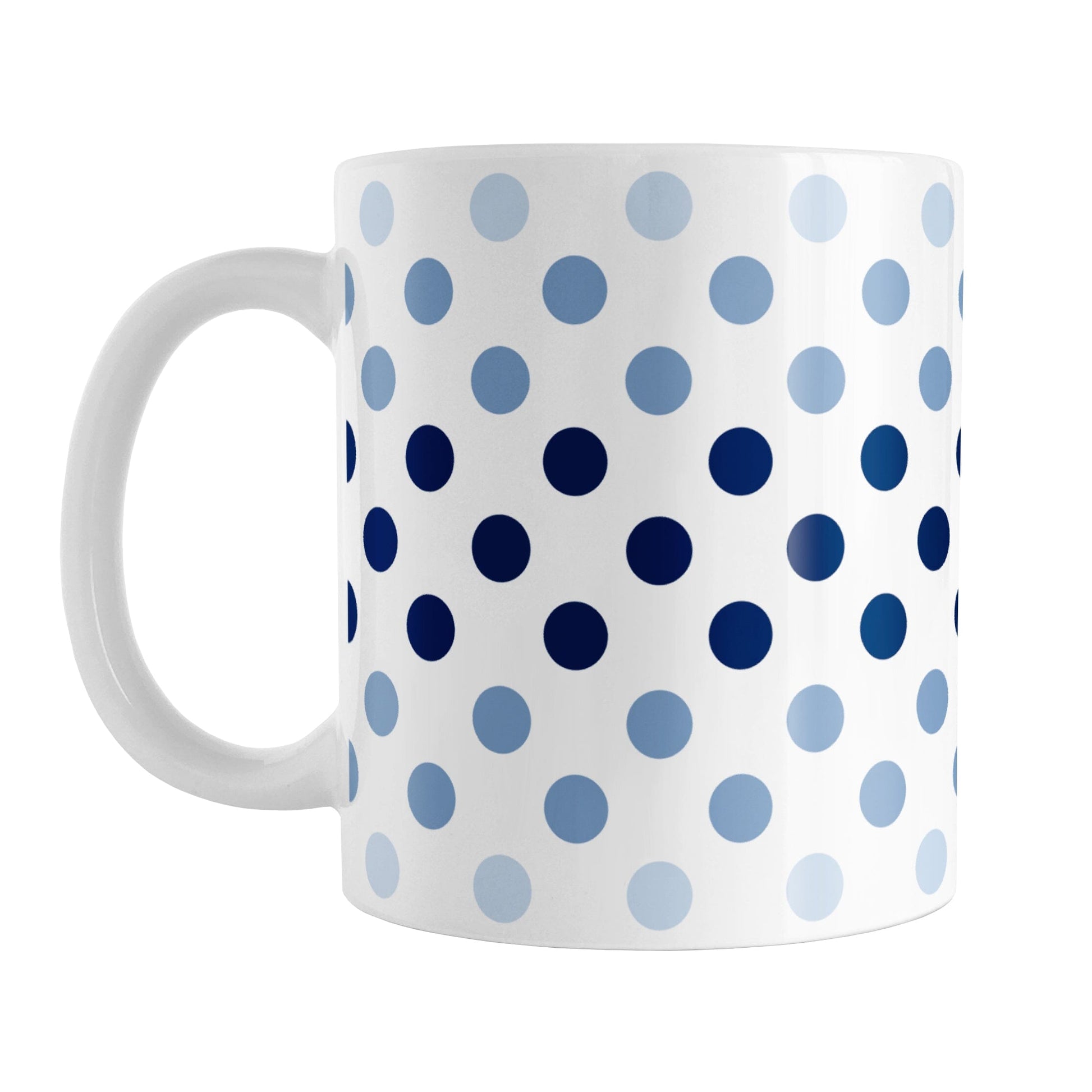 Polka Dots in Blue Mug (11oz) at Amy's Coffee Mugs. A ceramic coffee mug designed with polka dots in different shades of blue, with the darker blue color across the middle and the lighter blue along the top and bottom, in a pattern that wraps around the mug to the handle.