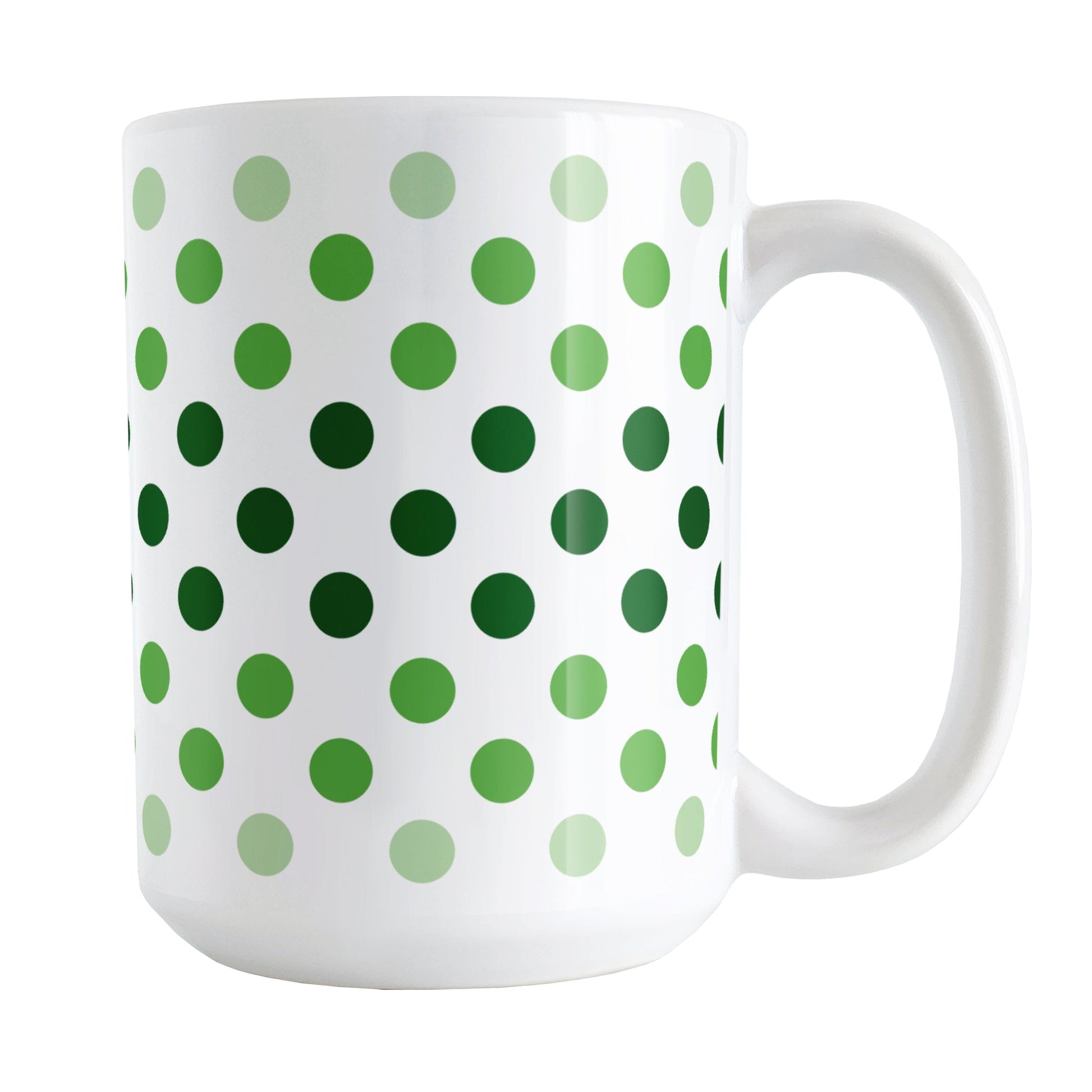 Polka Dots in Green Mug (15oz) at Amy's Coffee Mugs. A ceramic coffee mug designed with polka dots in different shades of green, with the darker green color across the middle and the lighter green along the top and bottom, in a pattern that wraps around the mug to the handle.