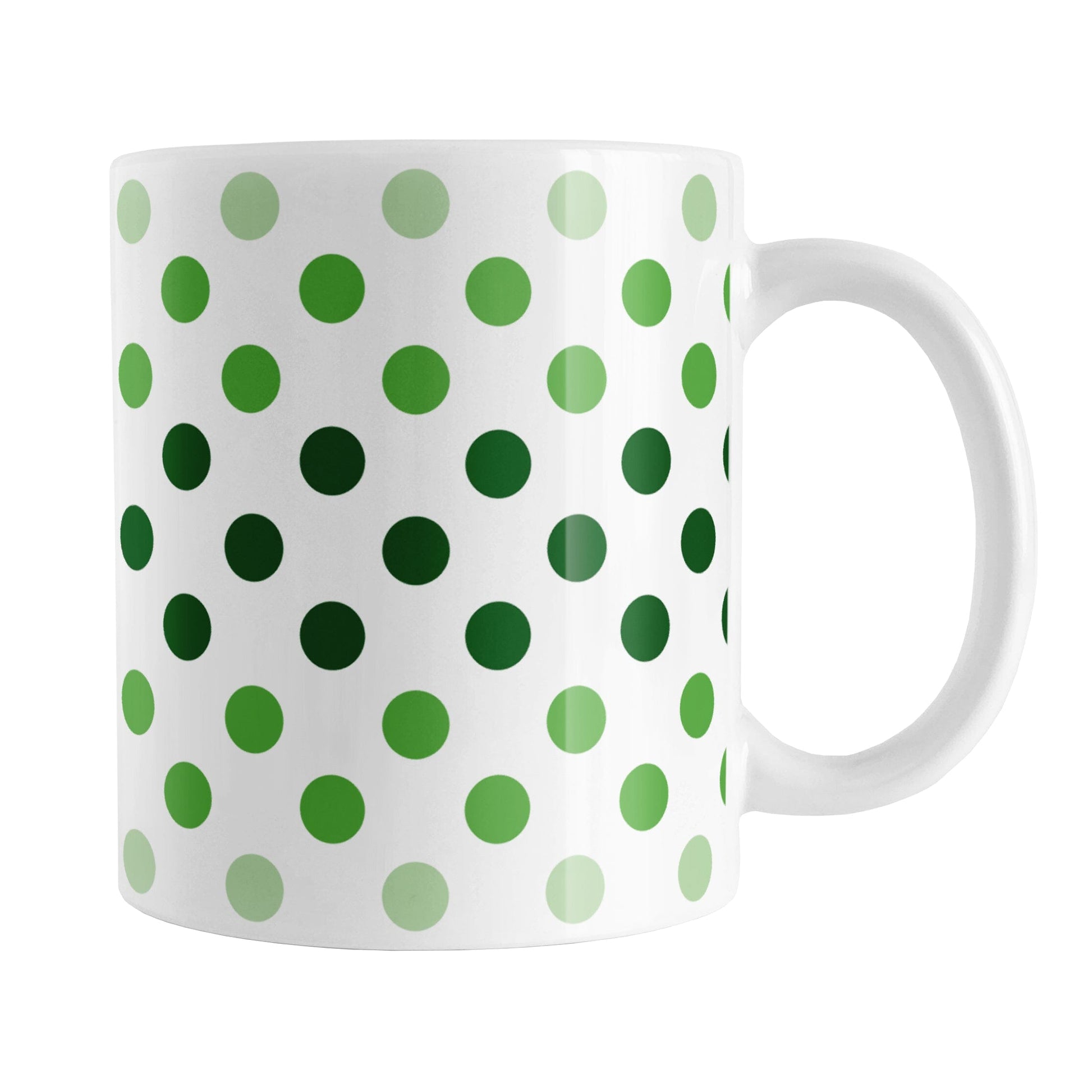 Polka Dots in Green Mug (11oz) at Amy's Coffee Mugs. A ceramic coffee mug designed with polka dots in different shades of green, with the darker green color across the middle and the lighter green along the top and bottom, in a pattern that wraps around the mug to the handle.