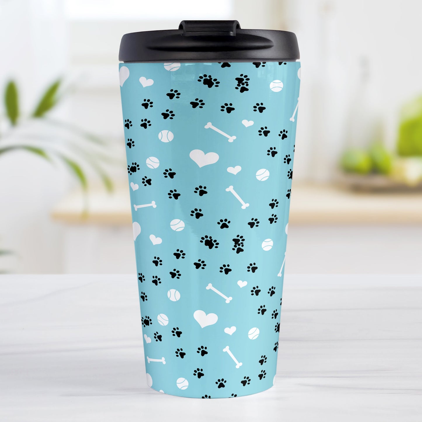 Puppy Run Blue Dog Travel Mug (15oz) at Amy's Coffee Mugs. A stainless steel travel mug designed with a pattern of chaotic tracks of puppy paw prints running around the mug with white dog bones, balls, and hearts over a light blue background. This mug is perfect for people who love the chaotic play of puppies, love dogs, and like blue travel mugs.