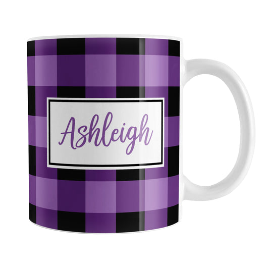 Purple and Black Personalized Name Buffalo Plaid Mug (11oz) at Amy's Coffee Mugs. A ceramic coffee mug designed with a purple and black buffalo plaid (buffalo check) pattern that wraps around the mug up to the handle. Your name is printed in a purple script font in a white frame design on both sides of the mug over the buffalo plaid background.