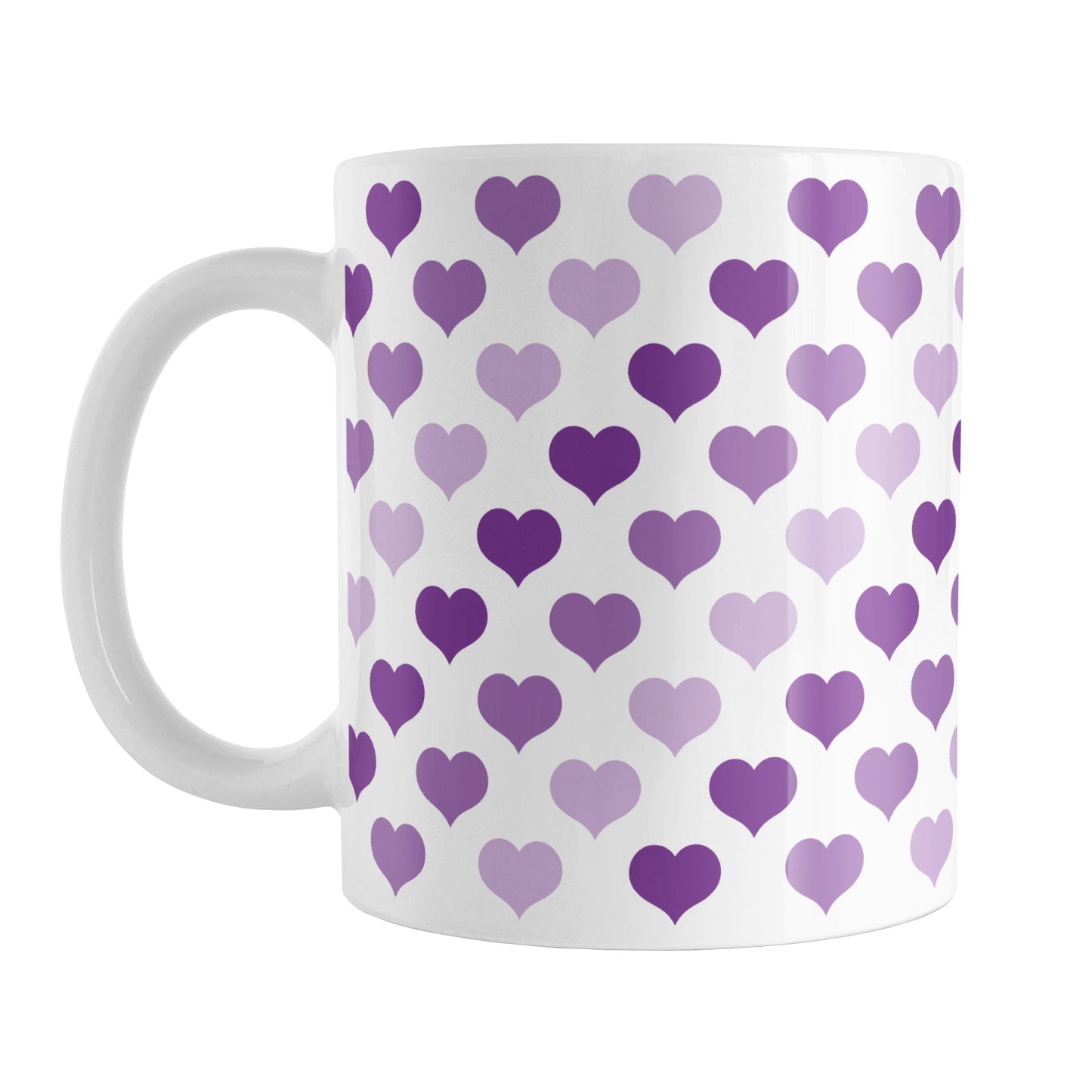Purple Hearts Pattern Mug (11oz) at Amy's Coffee Mugs. A ceramic coffee mug designed with a pattern of hearts in three different shades of purple that wraps around the mug up to the handle.