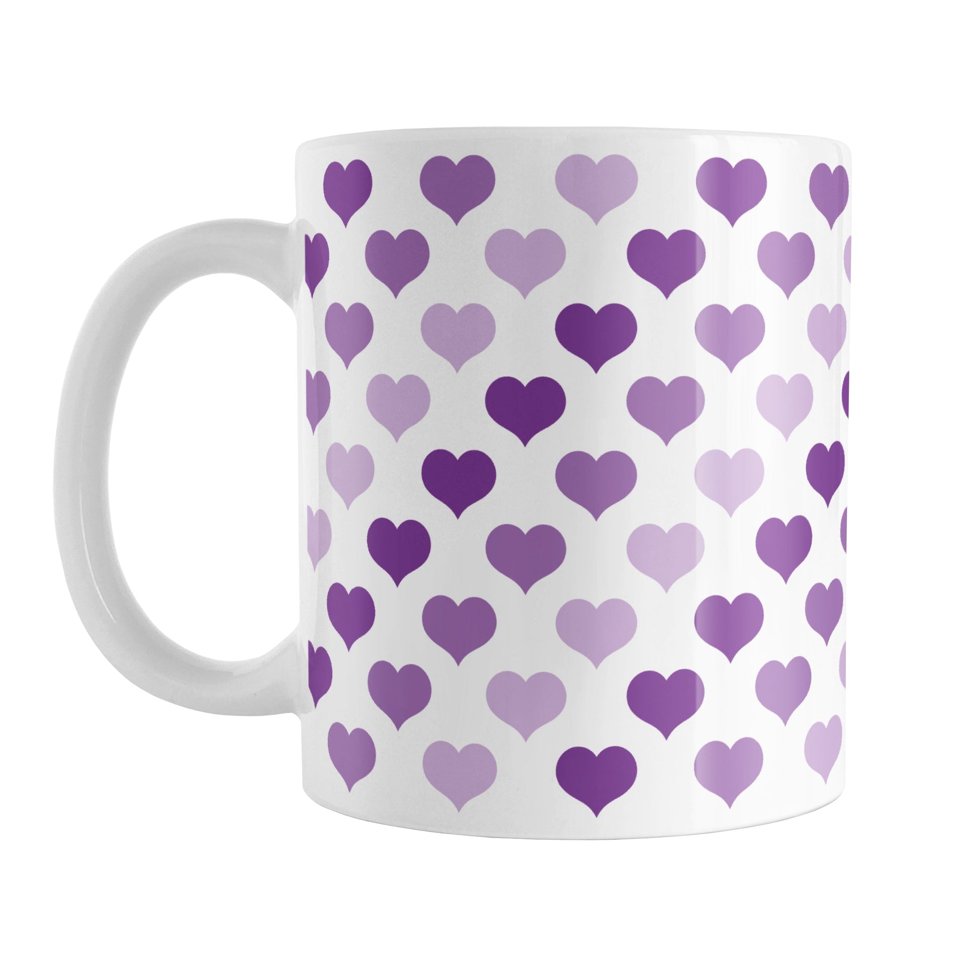 Purple Hearts Pattern Mug (11oz) at Amy's Coffee Mugs. A ceramic coffee mug designed with a pattern of hearts in three different shades of purple that wraps around the mug up to the handle.