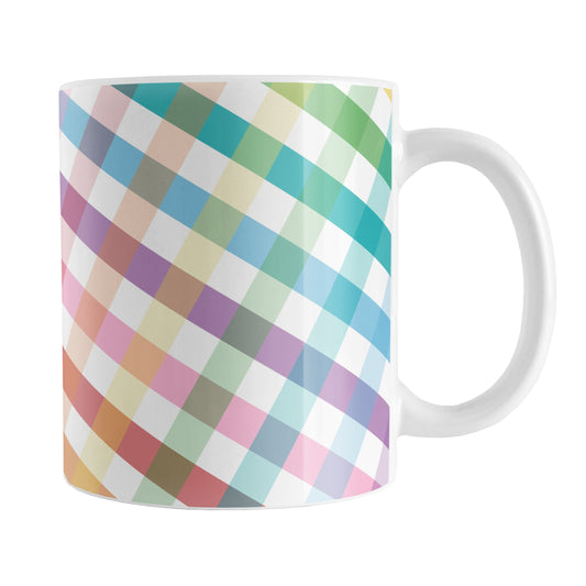 Rainbow Gingham Mug (11oz) at Amy's Coffee Mugs. A ceramic coffee mug designed with a slanted gingham pattern with a colorful rainbow progression that wraps around the mug up to the handle.