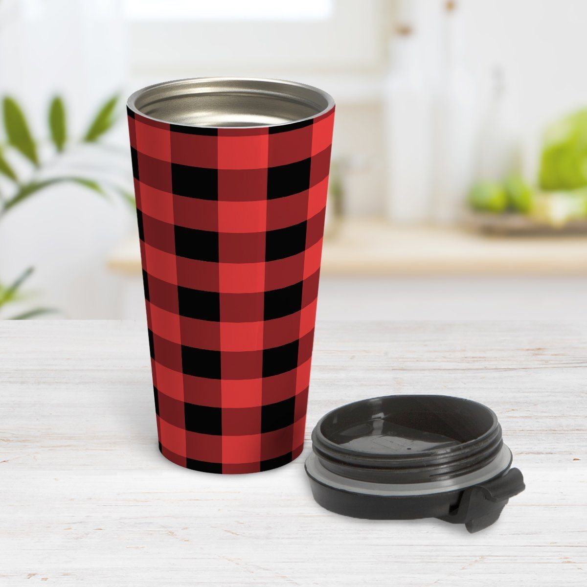 Red and Black Buffalo Plaid Travel Mug at Amy's Coffee Mugs. A travel mug designed with a red and black buffalo plaid (buffalo check) pattern that wraps around the mug. Photo shows the mug open on a table with its lid beside it.