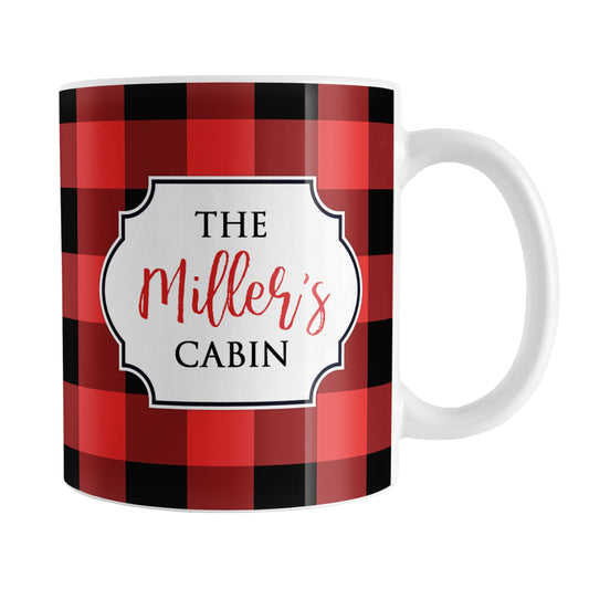 Red and Black Personalized Buffalo Plaid Mug (11oz) at Amy's Coffee Mugs. A ceramic coffee mug designed with a red and black buffalo plaid (buffalo check) pattern that wraps around the mug up to the handle, and your personalization is done in a white frame design on both sides of the mug over the buffalo plaid background.