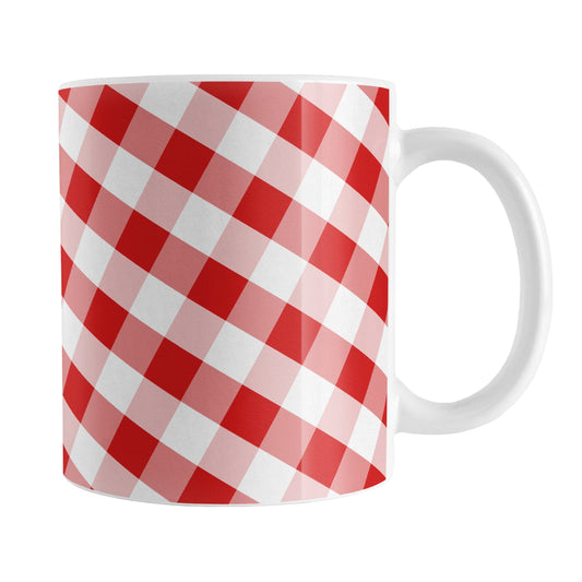 Red Gingham Mug (11oz) at Amy's Coffee Mugs. A ceramic coffee mug designed with a slanted white and red gingham pattern that wraps around the mug up to the handle.