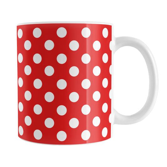 Red Polka Dot Mug (11oz) at Amy's Coffee Mugs. A ceramic coffee mug designed with a pattern of white polka dots over a red background color that wraps around the mug up to the handle.