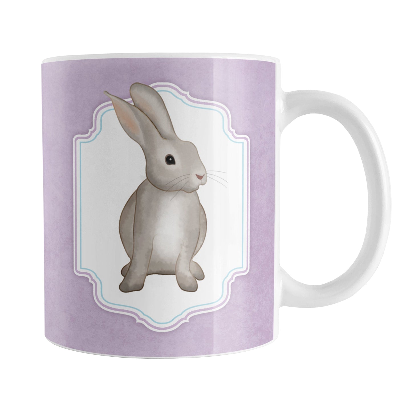 Rustic Purple Rabbit Mug (11oz) at Amy's Coffee Mugs. A ceramic coffee mug designed with a watercolor inspired illustration of a brown bunny rabbit in a white frame area outlined in purple and blue, over a rustic purple background that wraps around the mug to the handle. This bunny illustration is on both sides of this purple rabbit mug.