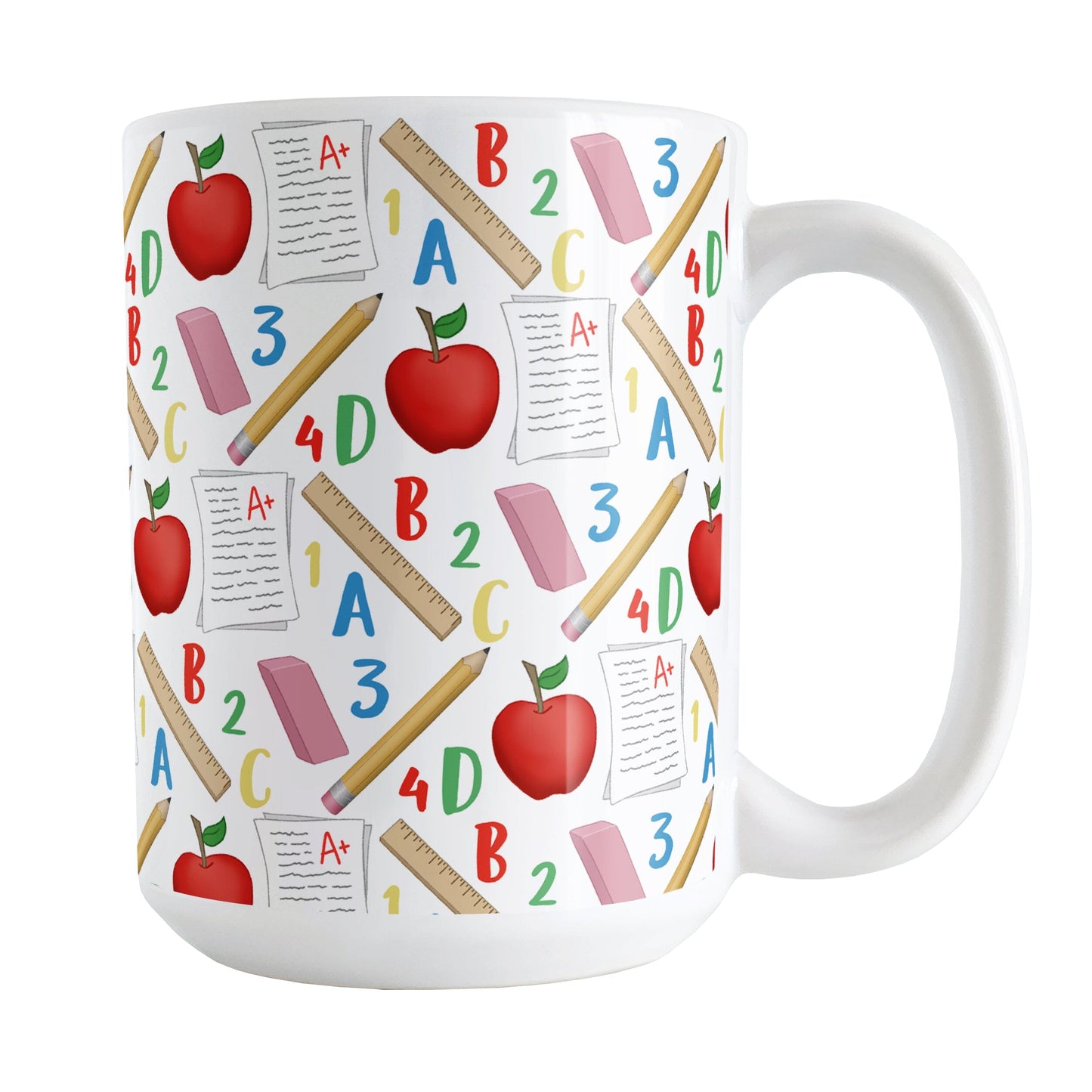 School Pattern Mug (15oz) at Amy's Coffee Mugs. A ceramic coffee mug designed with a school-themed pattern with apples, rulers, erasers, graded papers, numbers, and letters that wraps around the mug to the handle.