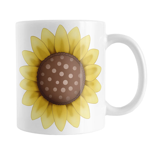 Sunflower Mug (11oz) at Amy's Coffee Mugs. A ceramic coffee mug designed with a big bright yellow sunflower illustration, with a dotted brown center, on both sides of the mug.