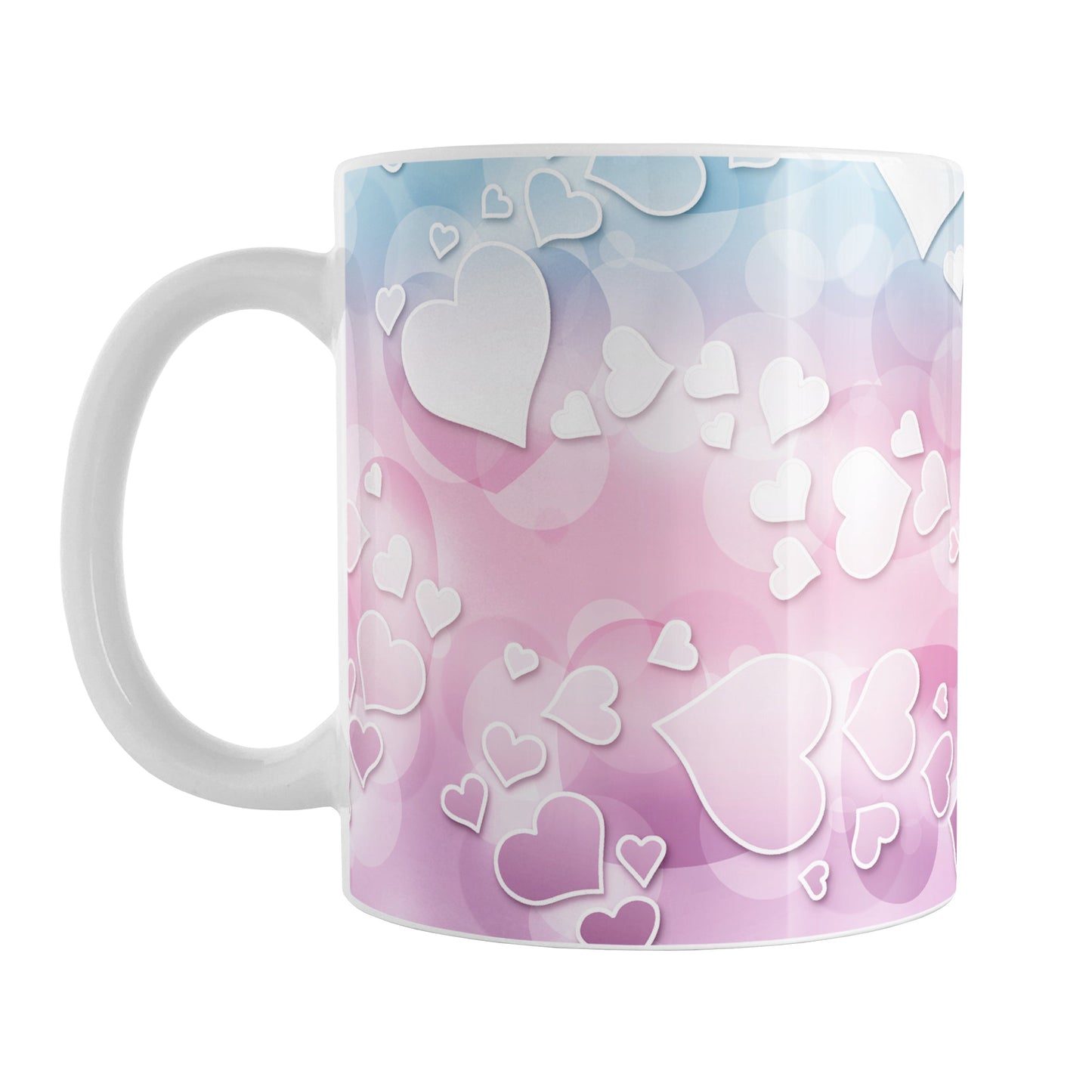 Whimsical Hearts Pattern Mug (11oz) at Amy's Coffee Mugs. A ceramic coffee mug designed with a whimsical pattern of hearts over a gradient bokeh background in pink, blue, and purple that wraps around the mug up to the handle.