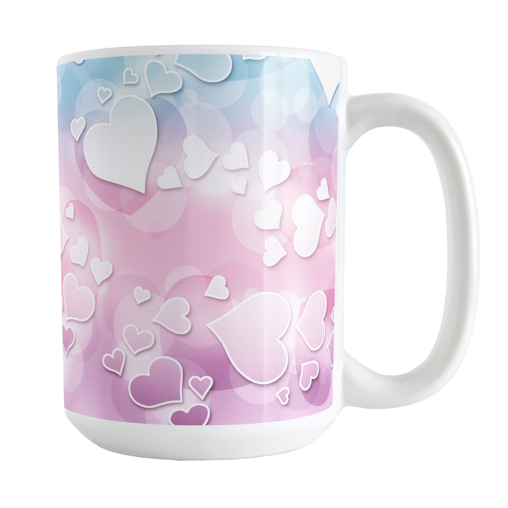 Whimsical Hearts Pattern Mug (15oz) at Amy's Coffee Mugs. A ceramic coffee mug designed with a whimsical pattern of hearts over a gradient bokeh background in pink, blue, and purple that wraps around the mug up to the handle.