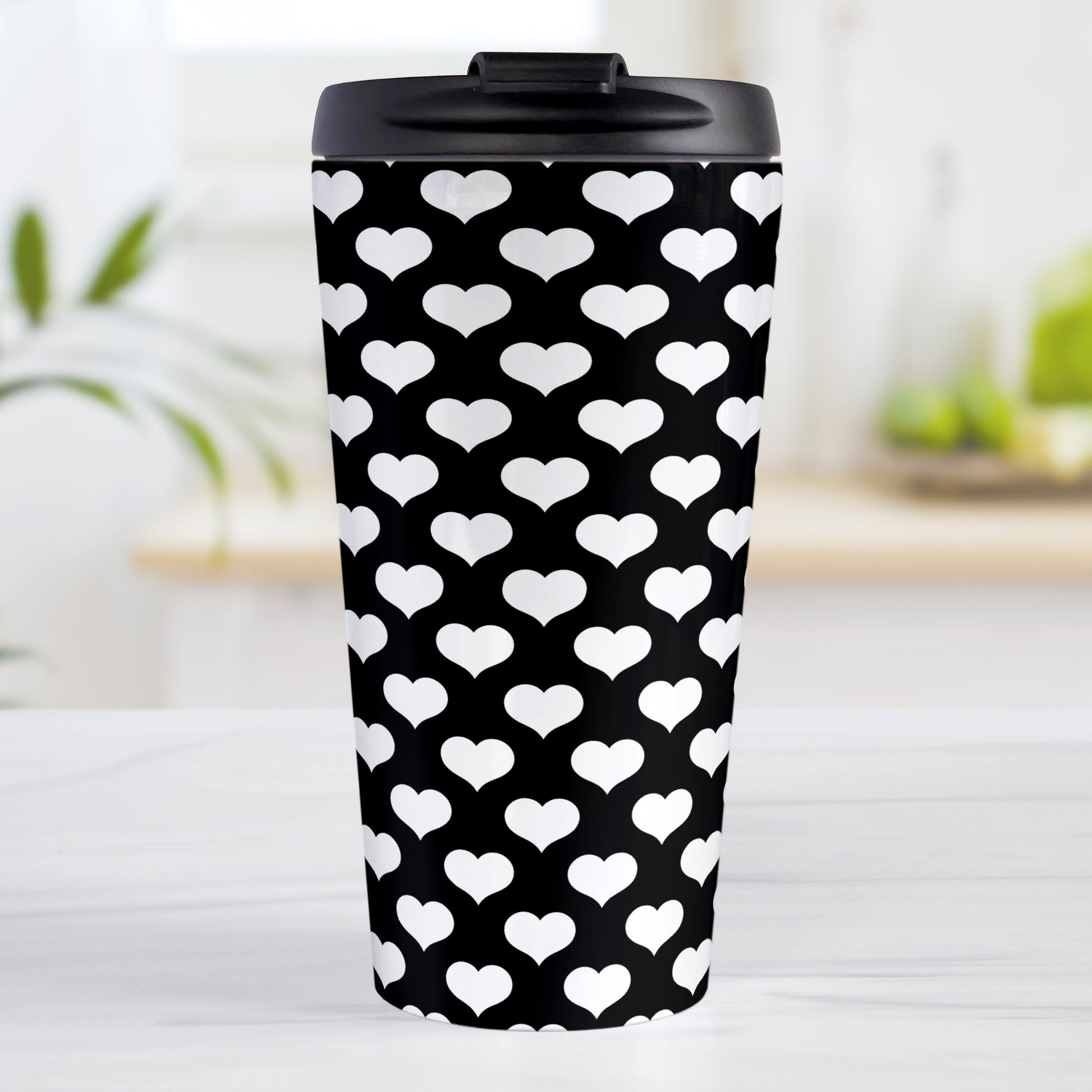 White Hearts Pattern Black Travel Mug (15oz, stainless steel insulated) at Amy's Coffee Mugs. A travel mug designed with white hearts in a polka-dotted style pattern over a black background color that wraps around the mug.