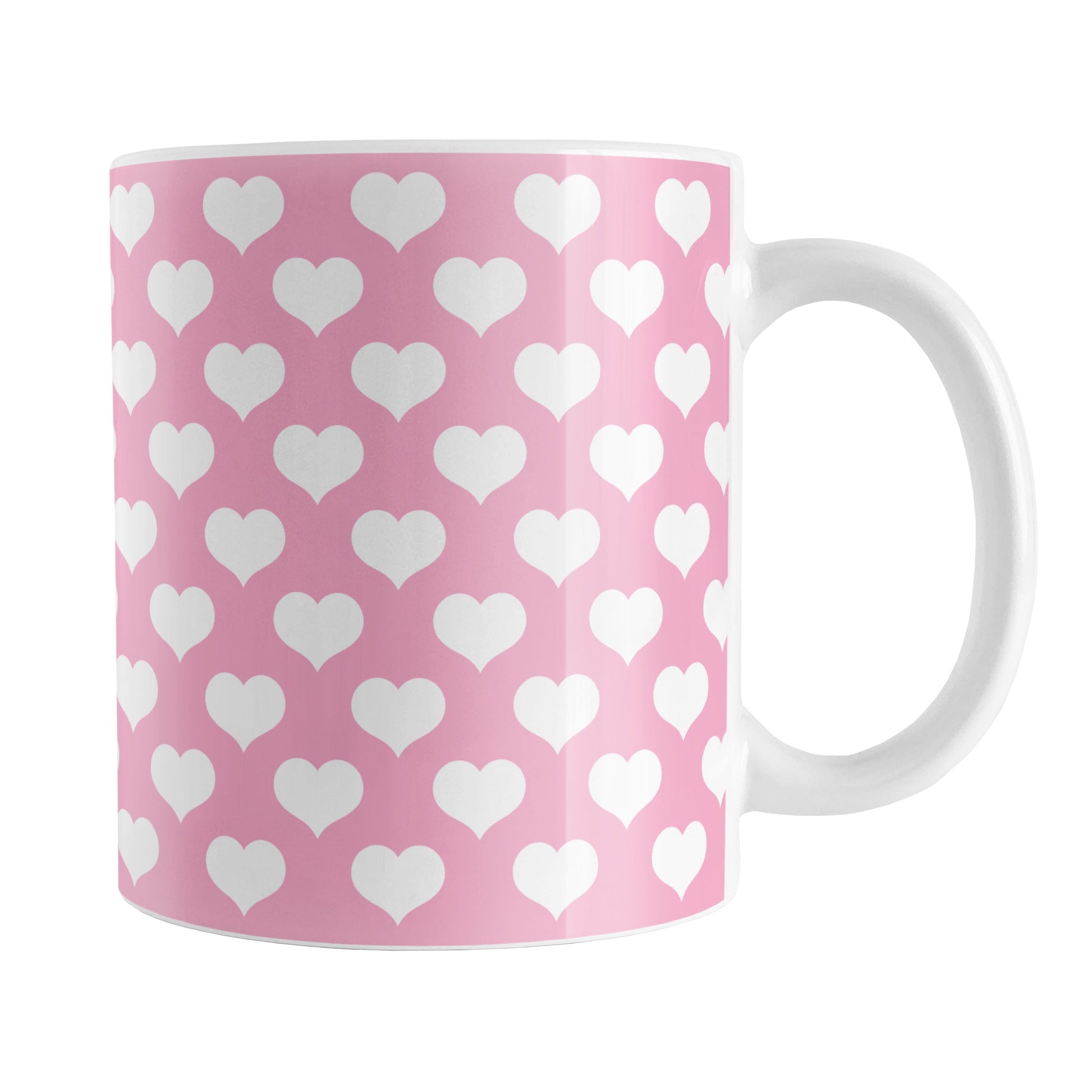 White Hearts Pattern Pink Mug (11oz) at Amy's Coffee Mugs. A ceramic coffee mug designed with white hearts in a polka-dotted style pattern over a pink background color that wraps around the mug up to the handle.