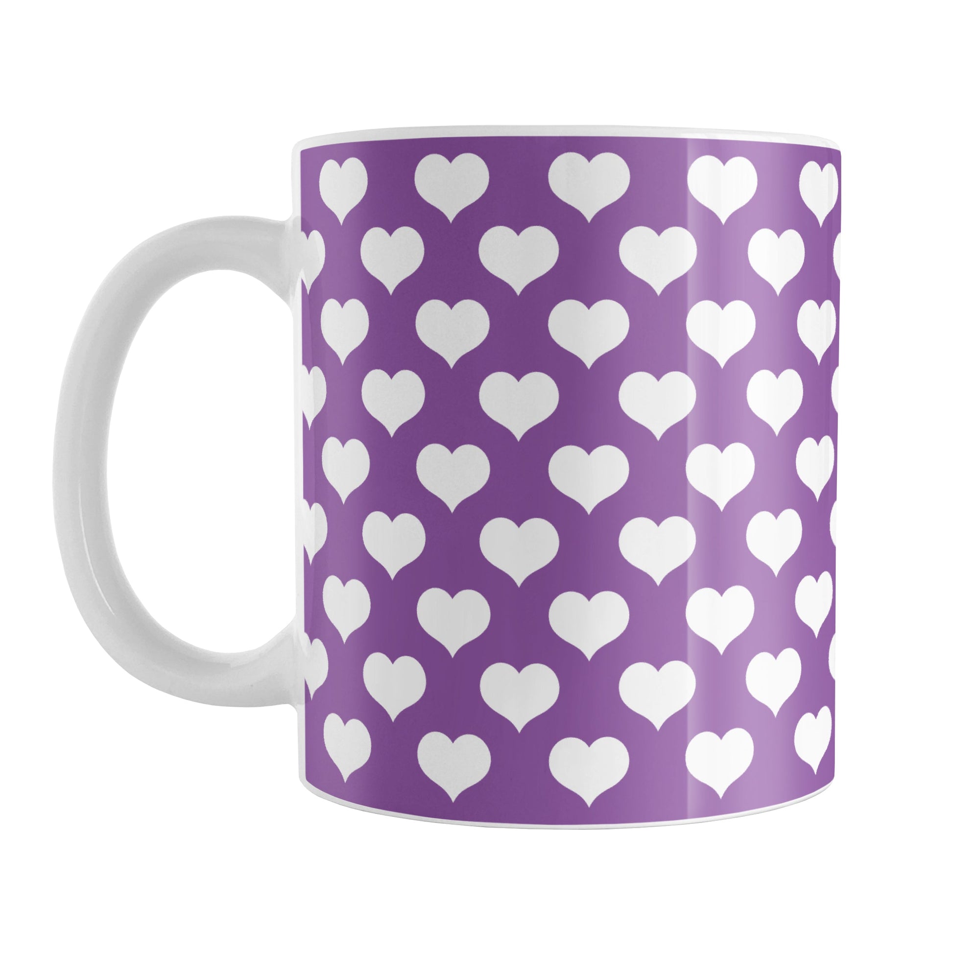 White Hearts Pattern Purple Mug (11oz) at Amy's Coffee Mugs. A ceramic coffee mug designed with white hearts in a polka-dotted style pattern over a purple background color that wraps around the mug up to the handle.