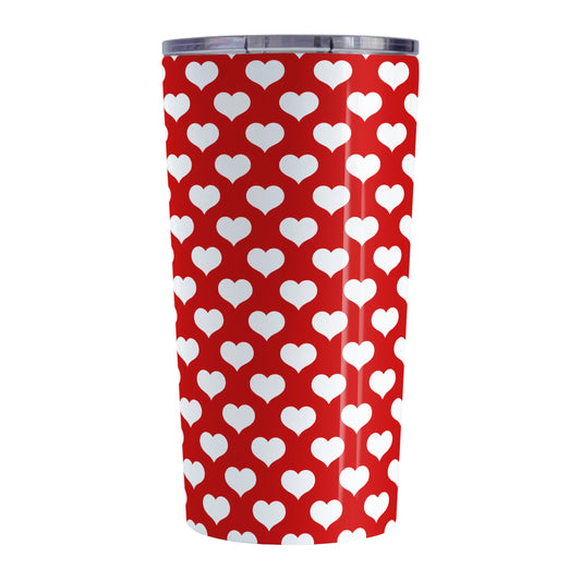 White Hearts Pattern Red Tumbler Cup (20oz, stainless steel insulated) at Amy's Coffee Mugs. A tumbler cup designed with white hearts in a polka-dotted style pattern over a red background color that wraps around the cup.